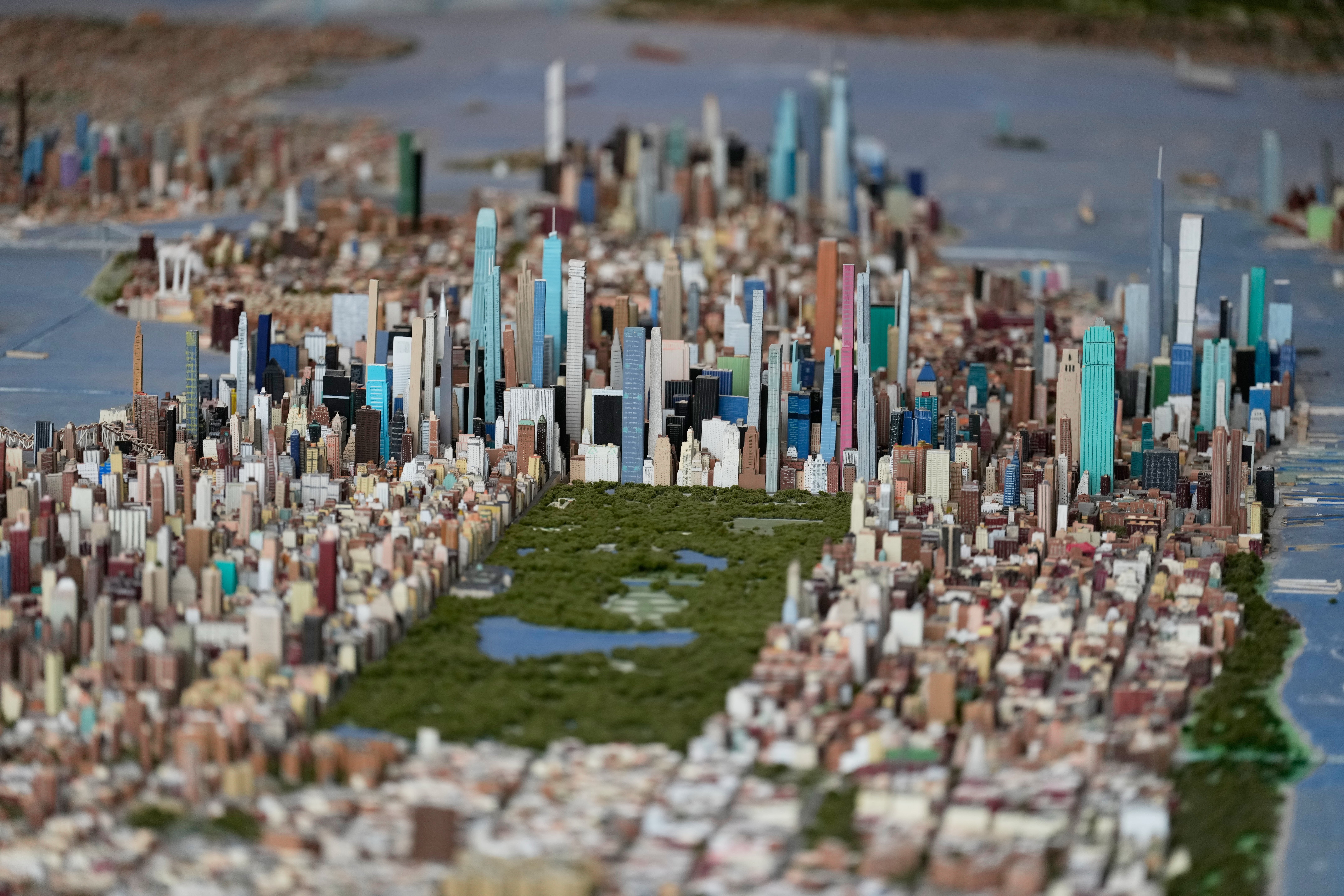 Central Park and the tall buildings of midtown Manhattan are seen on a large model of the New York City, made by Joe Macken, at the Museum of the City of New York