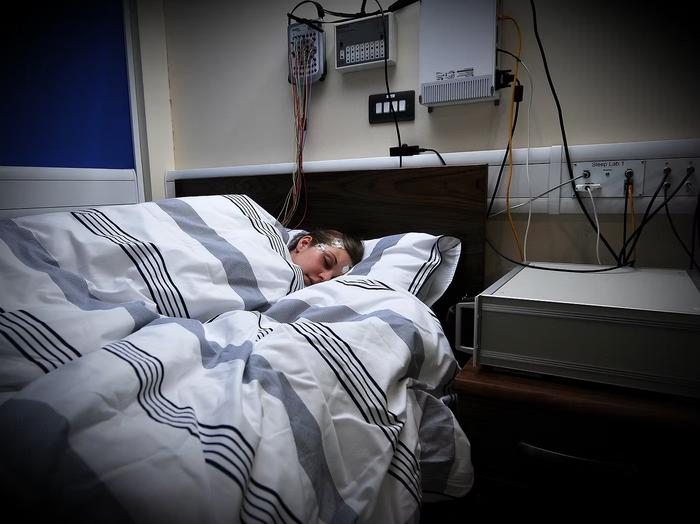 Participant takes part in a sleep study