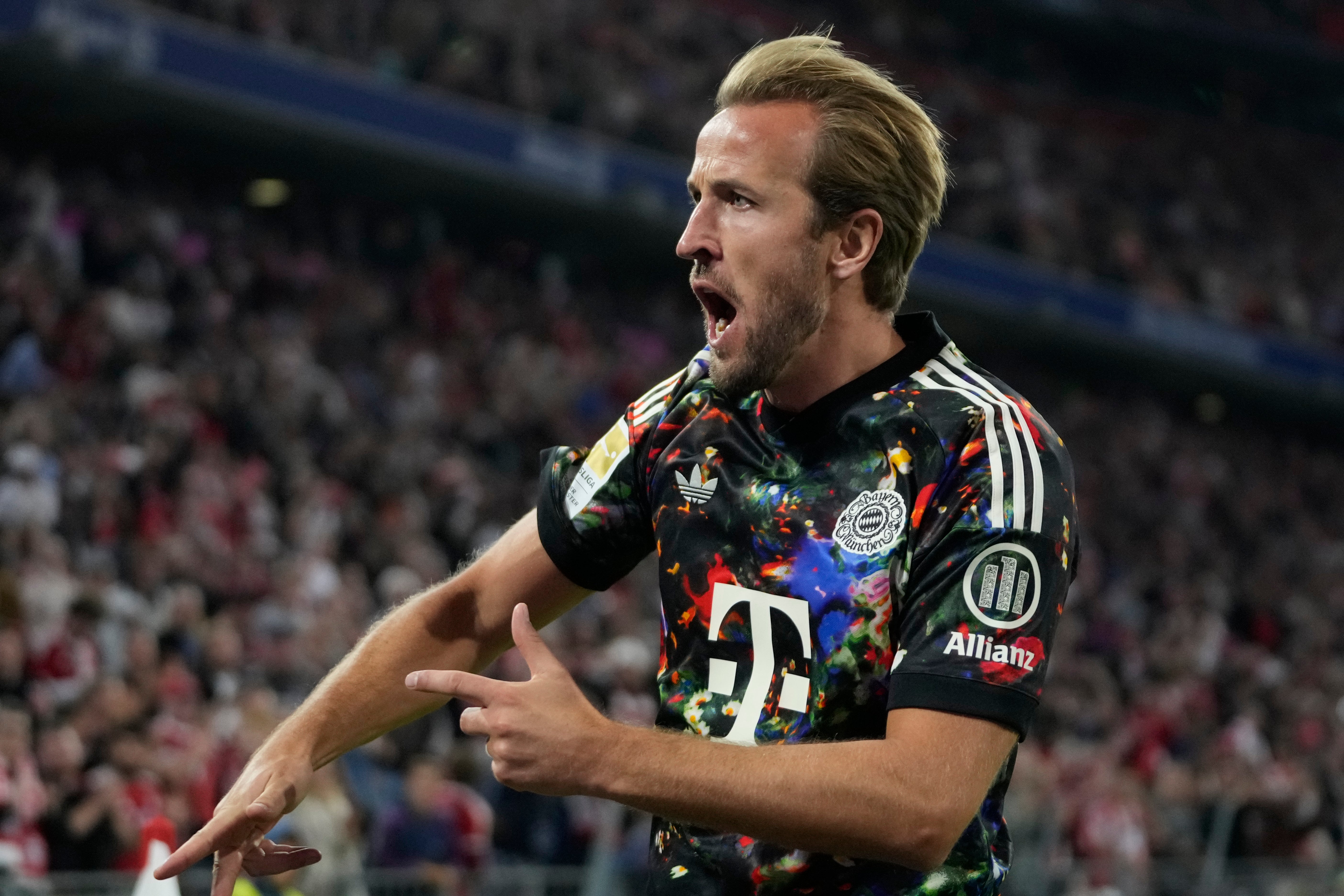 Bayern's Harry Kane celebrates after scoring his side's fourth goal between Bayern Munich and 1. FC Union Berlin