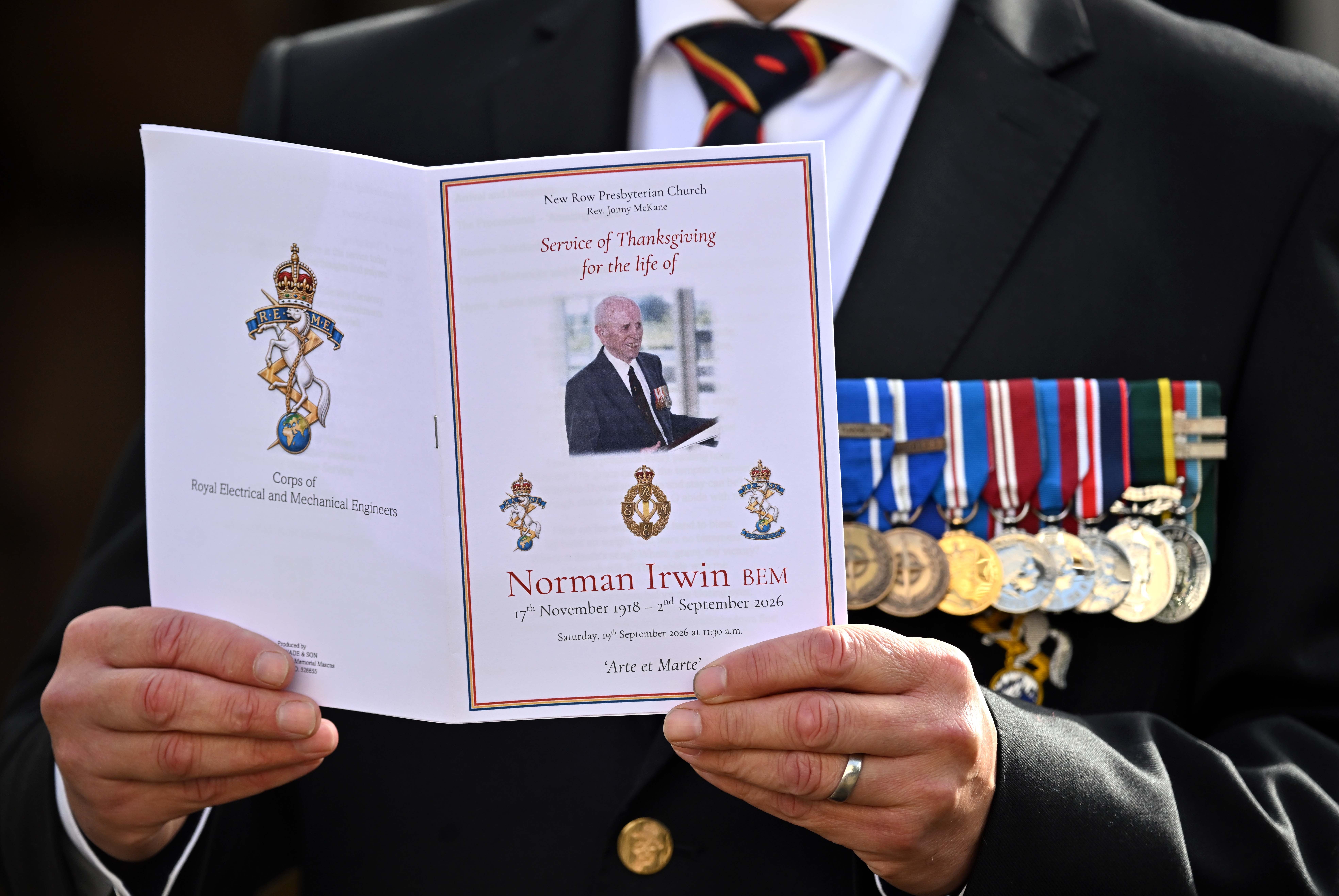 The flag of the Royal Electrical and Mechanical Engineers (REME), a corps of the British Army in which he served, was draped over his coffin