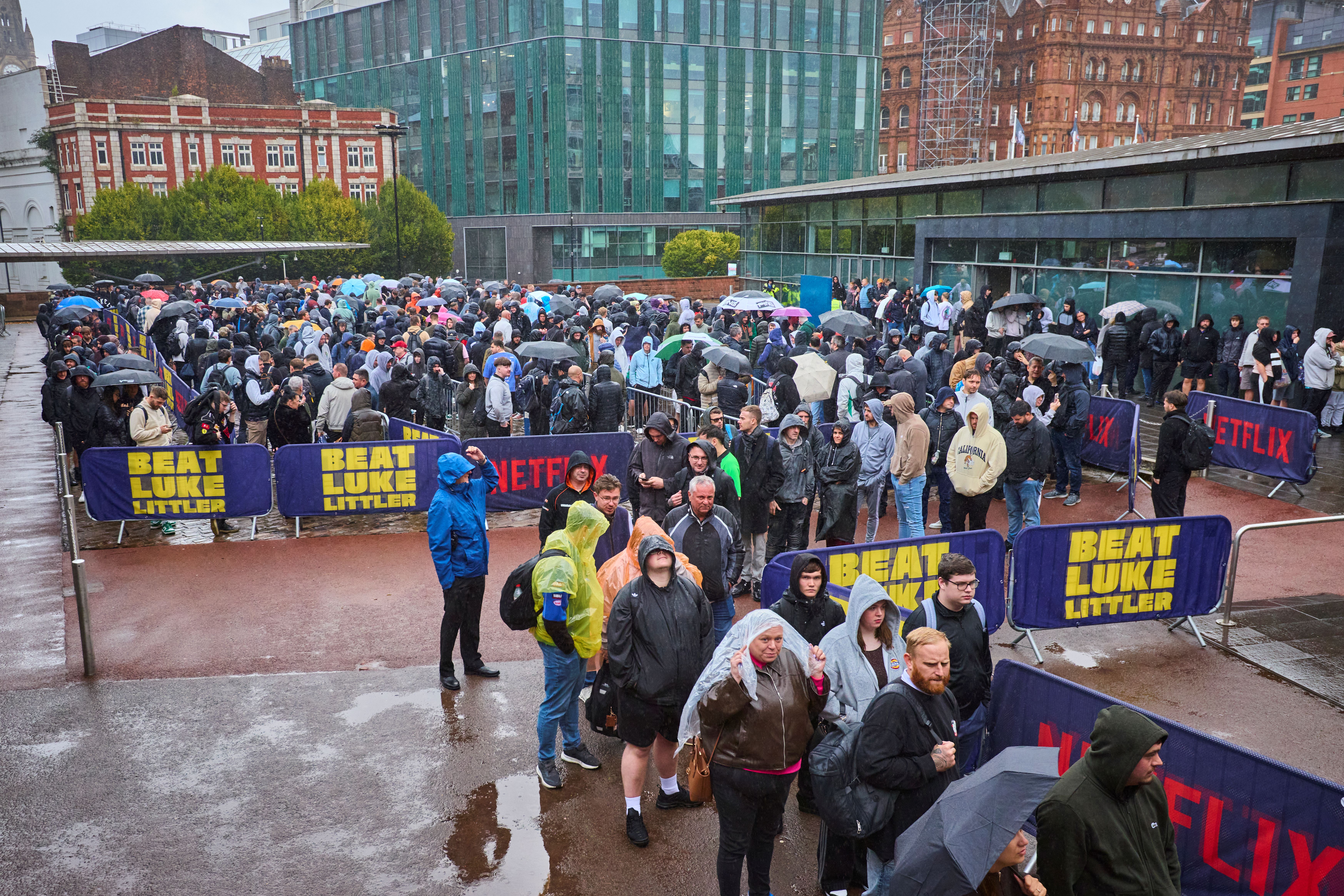 Thousands of amateur darts players brave the rain (Tom Dymond/Netflix)