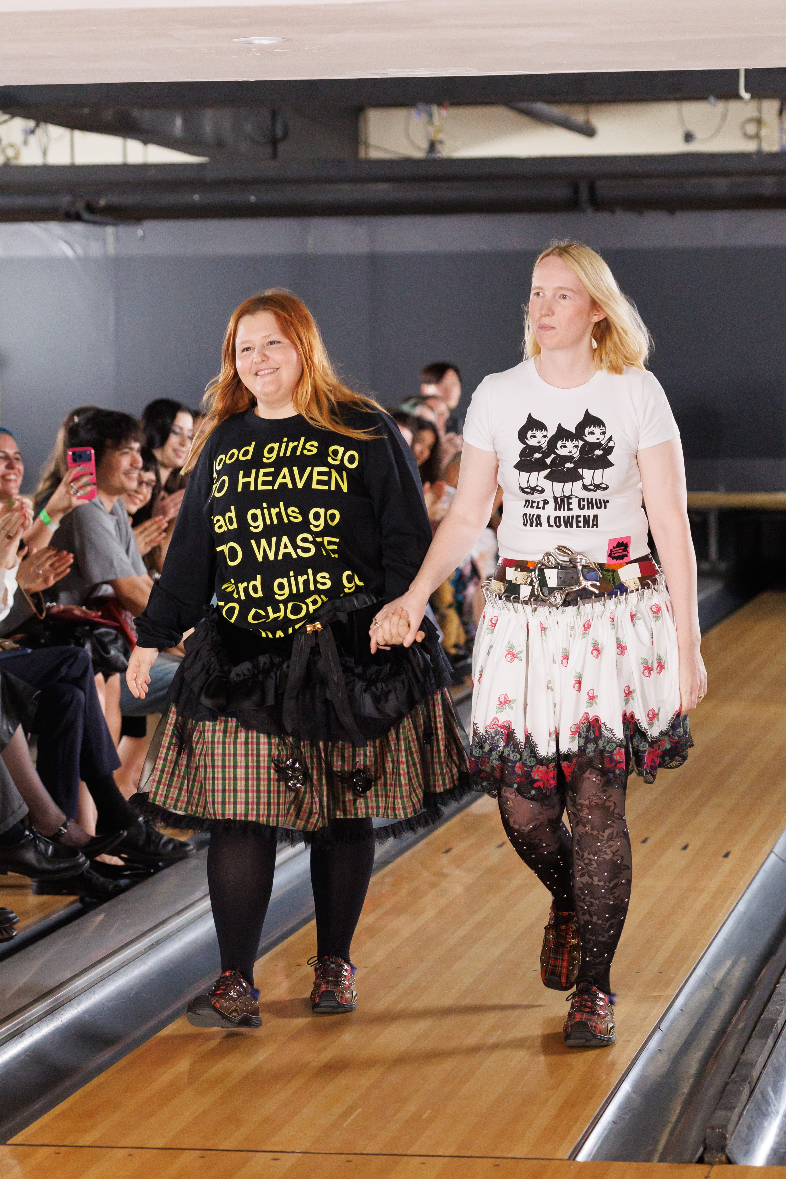 Designers Copova and Lowena on the runway (Jason Lloyd Evans/PA)