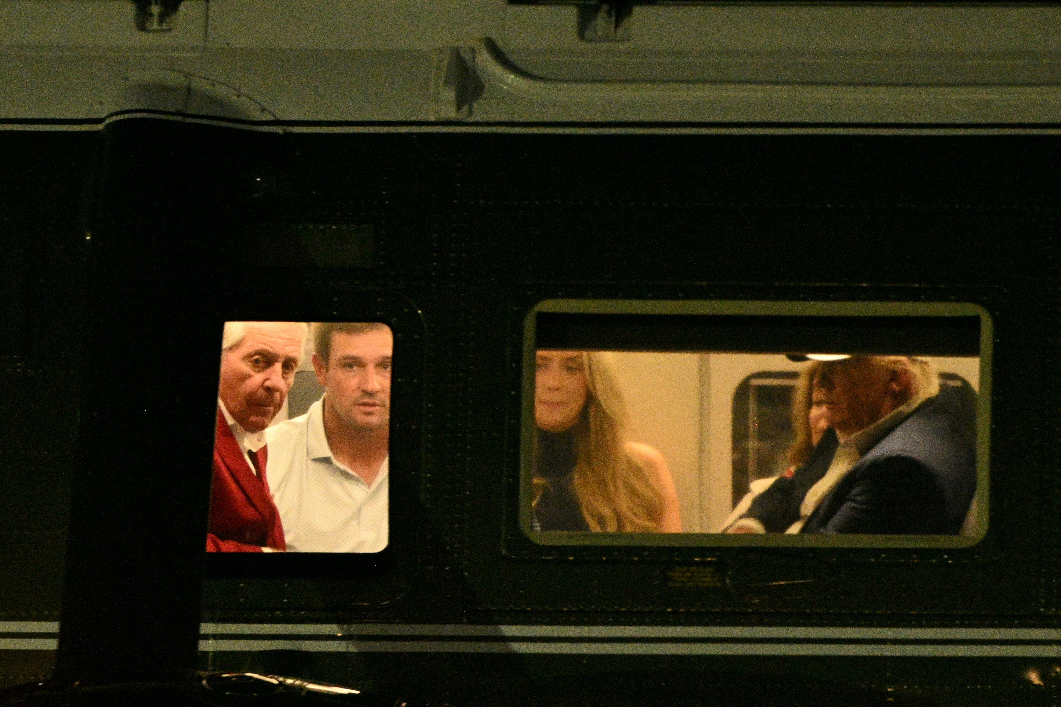 Donald Trump is pictured with Gary Player, Bryson DeChambeau and Mikayla Demaiter on board Marine One