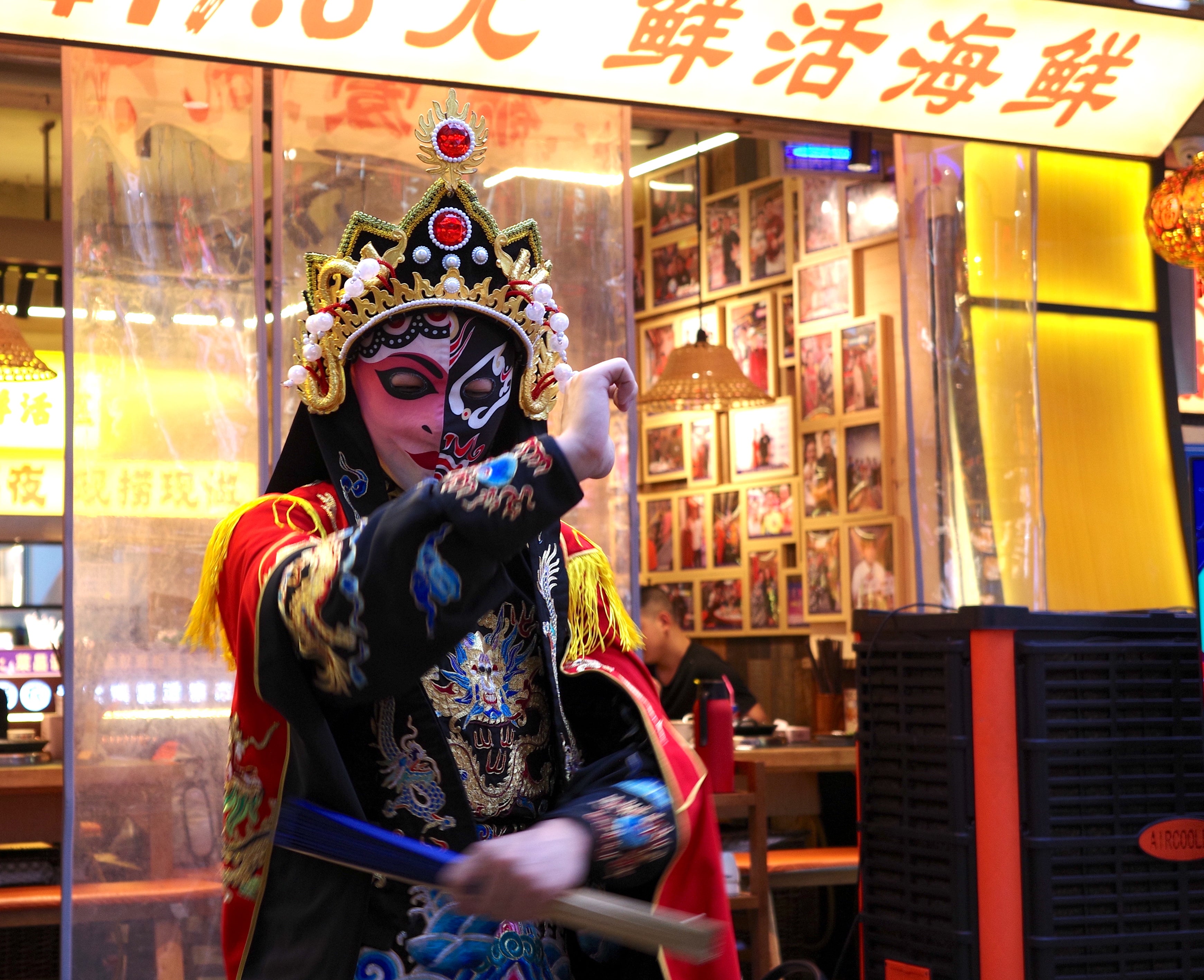 Performers deftly swipe between colourful silk masks as part of a tradition known as 'bian lian' or 'face-changing'