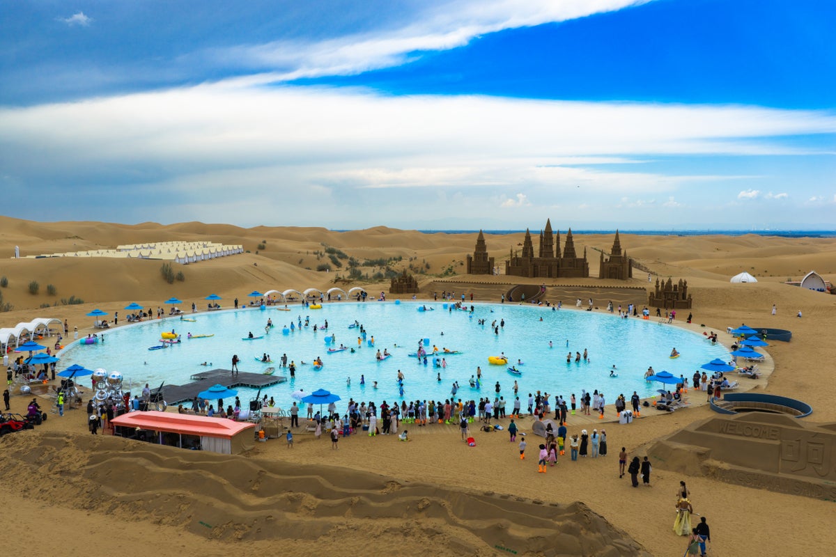 Visitors discover an oasis of relaxation in the Kubuqi Desert