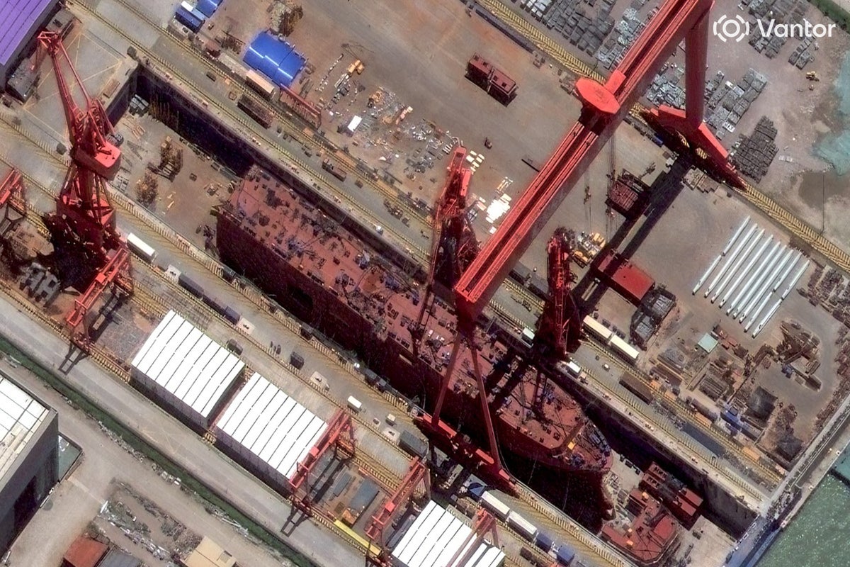 What is China building this giant ship for? Satellite images offer a clue
