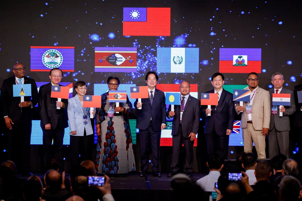 Taiwan labour minister visits China for APEC as tensions with Beijing continue