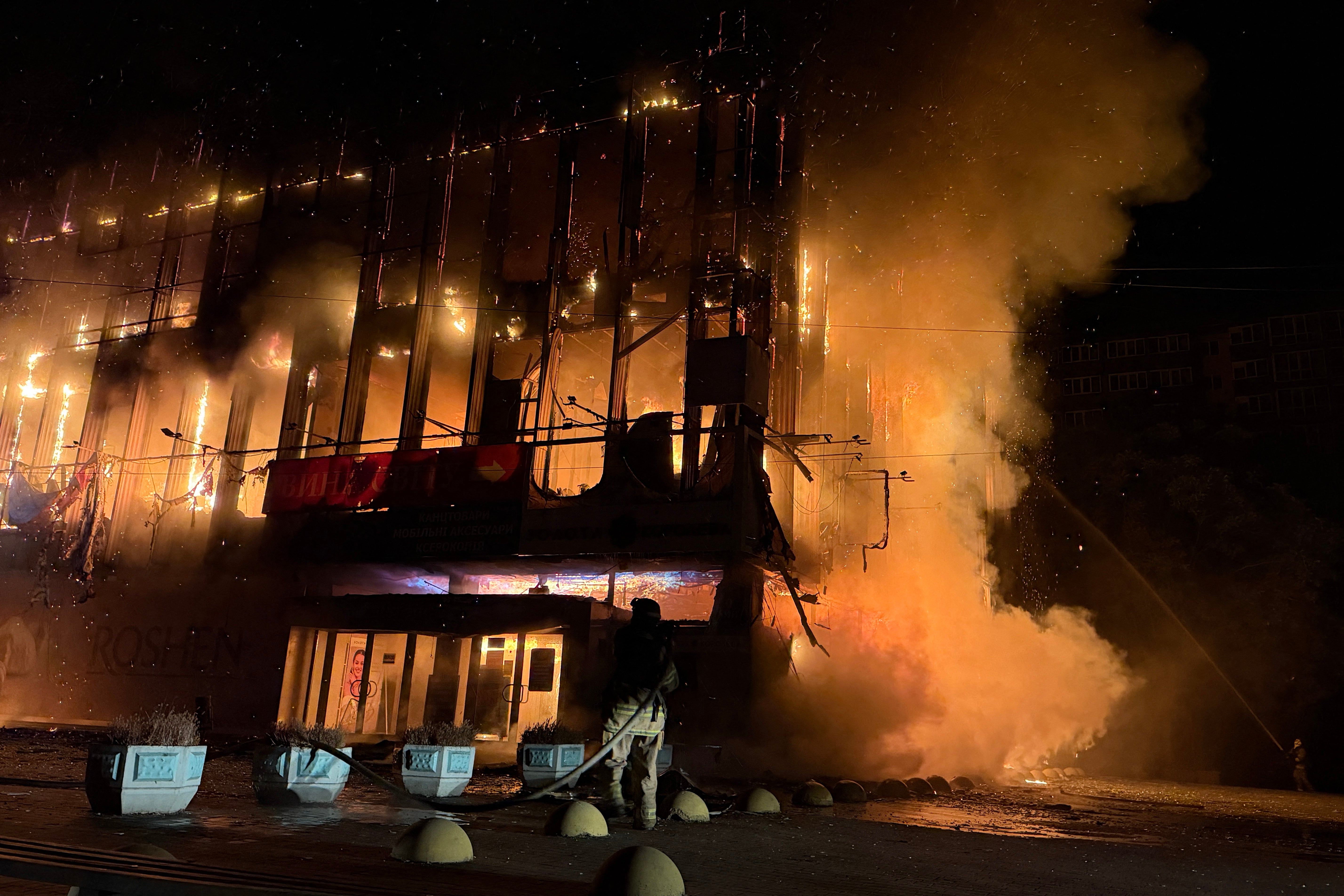 Ukrainian firefighters extinguish a fire at a building of Zaporizhzhia National University following a Russian drone strike in Zaporizhzhia on 21 September 2026
