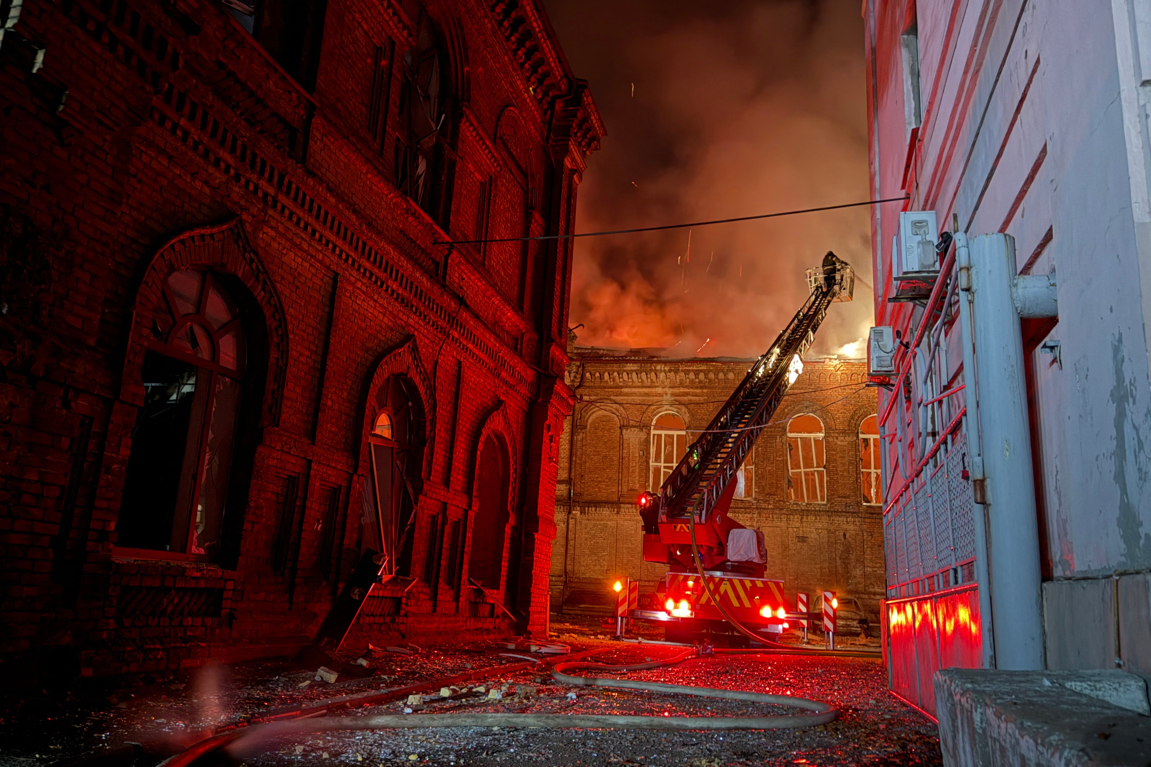 Ukrainian firefighters extinguish a fire at a building of Zaporizhzhia National University following a Russian drone strike in Zaporizhzhia on 21 September 2026