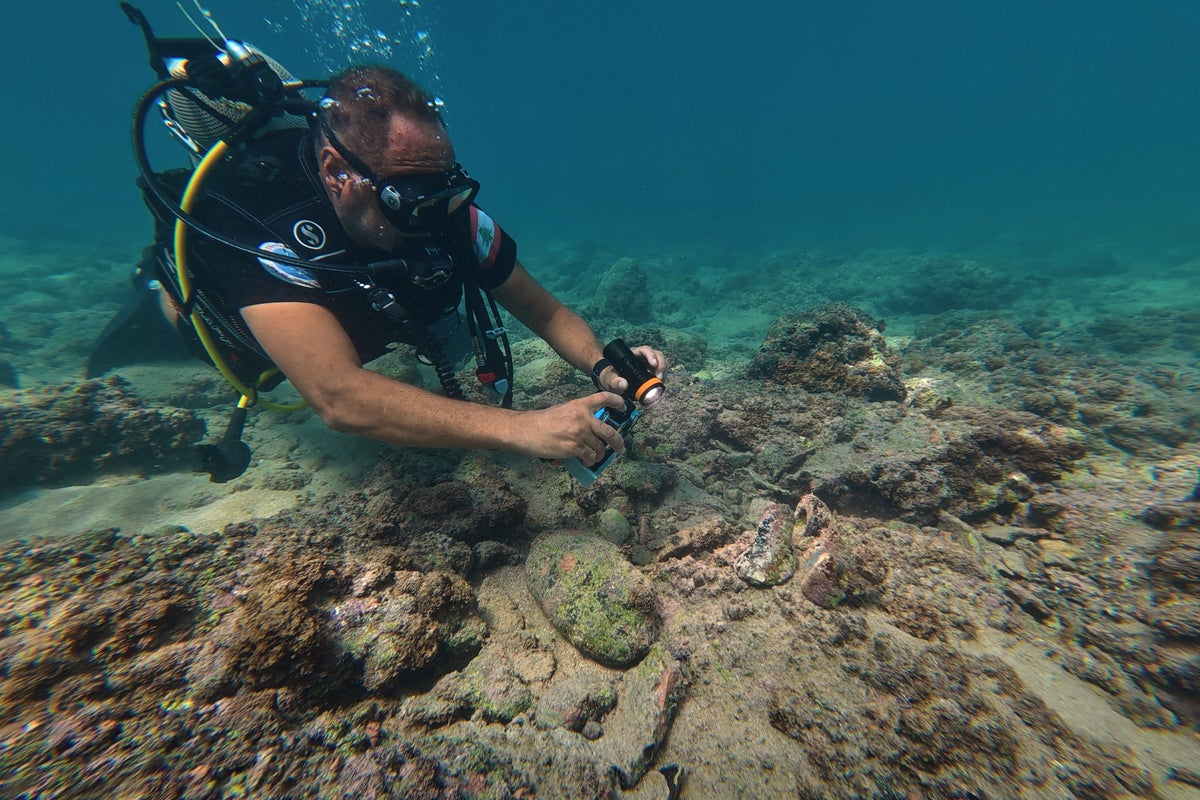 Divers return to Tyre’s submerged ruins off Lebanon after earlier strikes