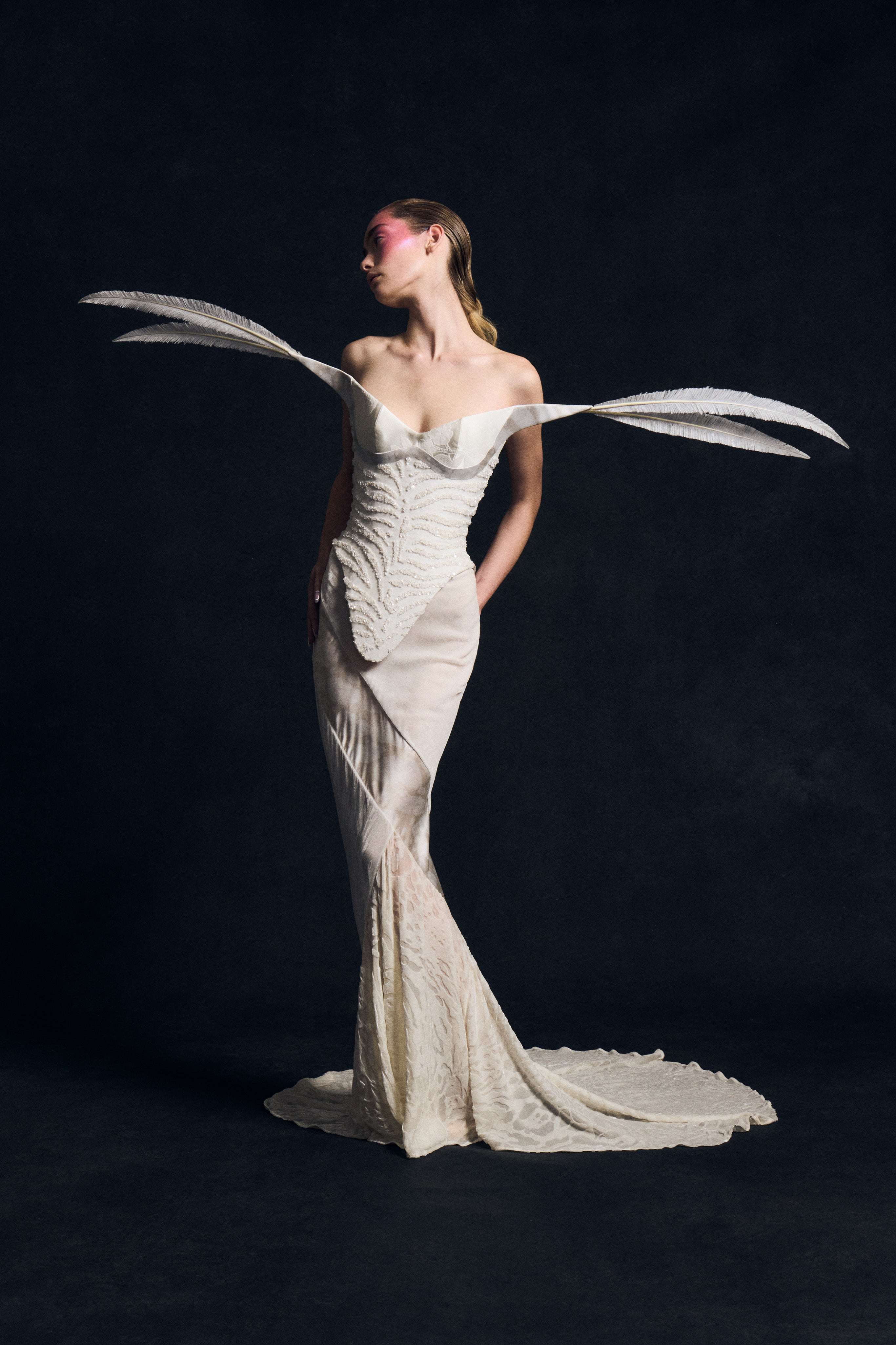 Harris Reed often references lingerie in his melodramatic silhouettes