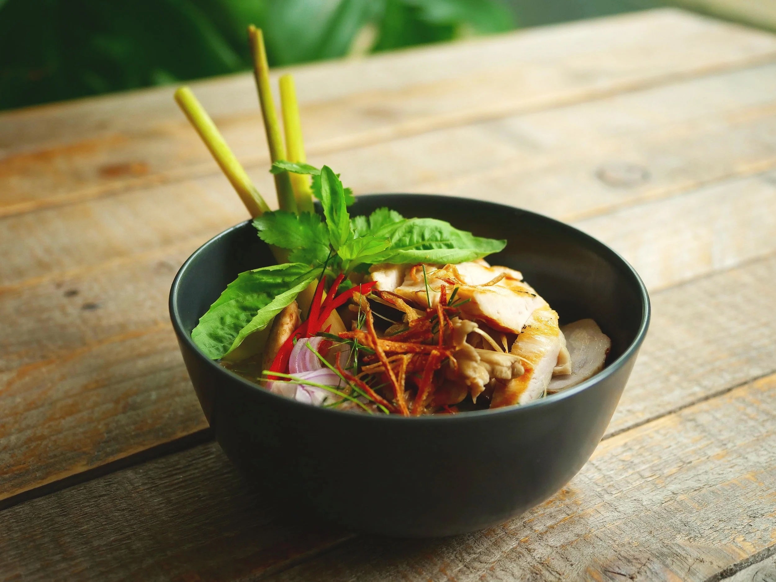 Smoked chicken, wild mushrooms and squash make for a deeply aromatic coconut soup sharpened with lime and chilli