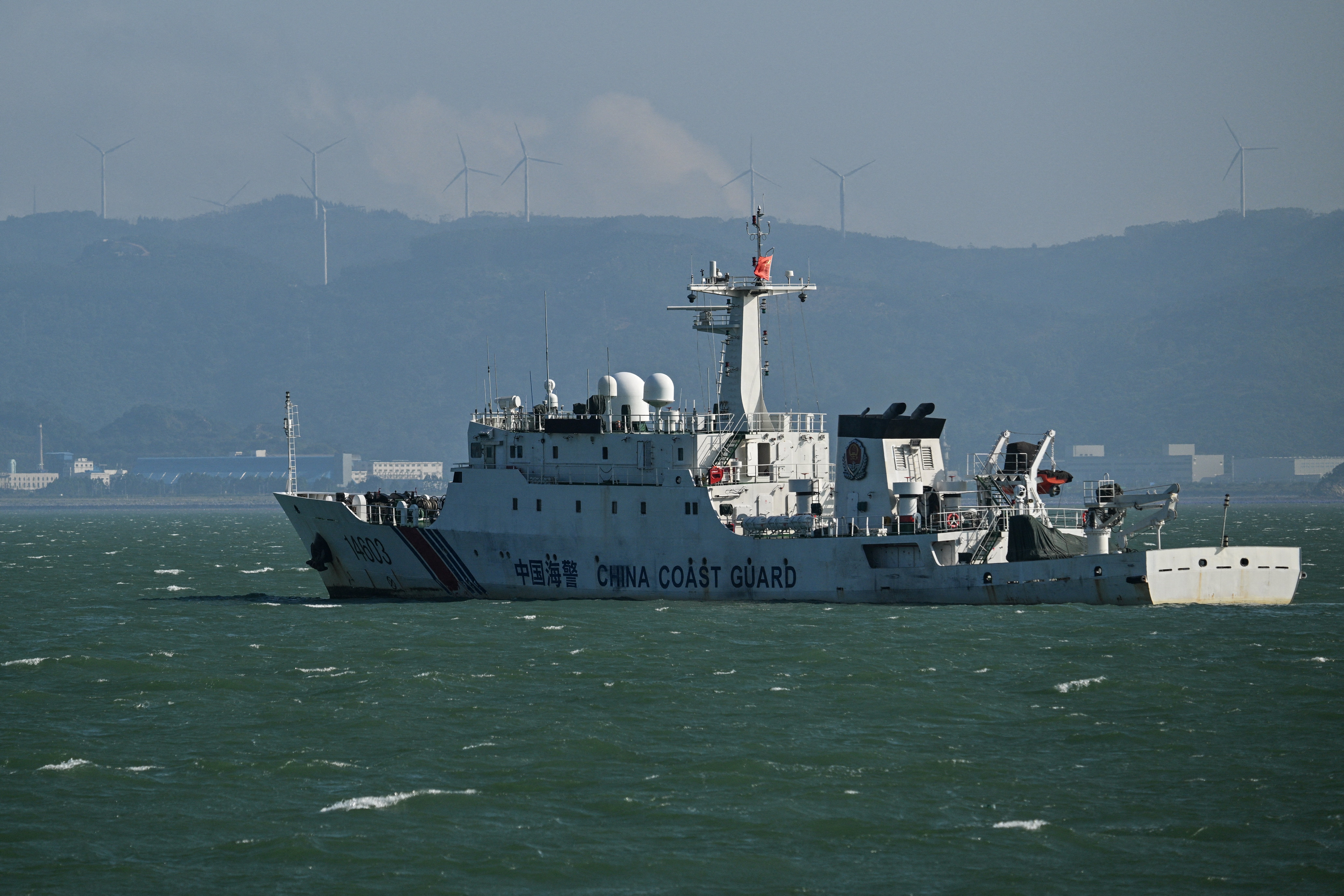 A Chinese Coast Guard vessel is seen along the coast of Xiamen, in China's southeastern Fujian province