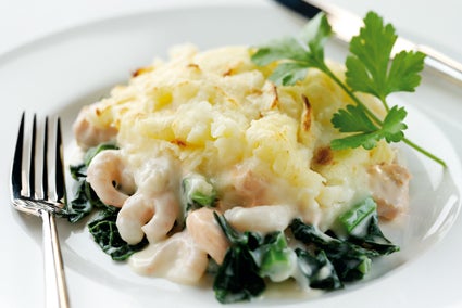A layer of cavolo nero brings colour and texture to a classic fish pie filled with salmon, cod and prawns (Discover Great Veg)