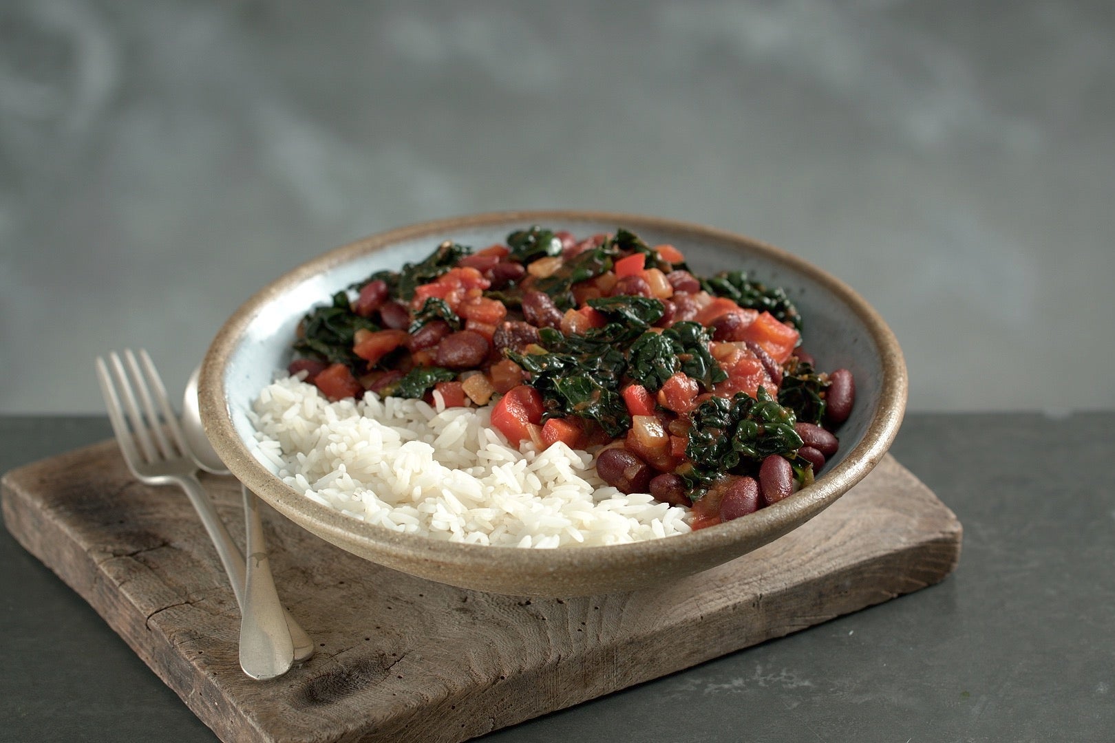 Cavolo nero does double duty here, stirred through the chilli and roasted until crisp for the topping (Discover Great Veg)
