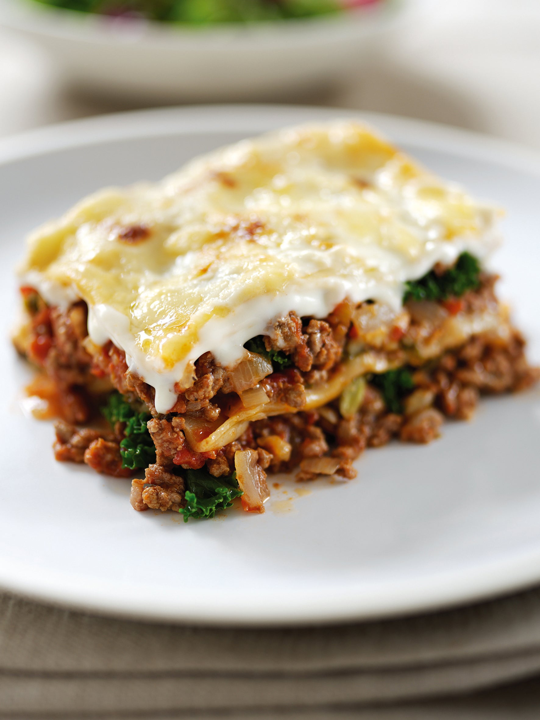 Kale slips neatly into the rich beef and tomato layers of this simple family lasagne