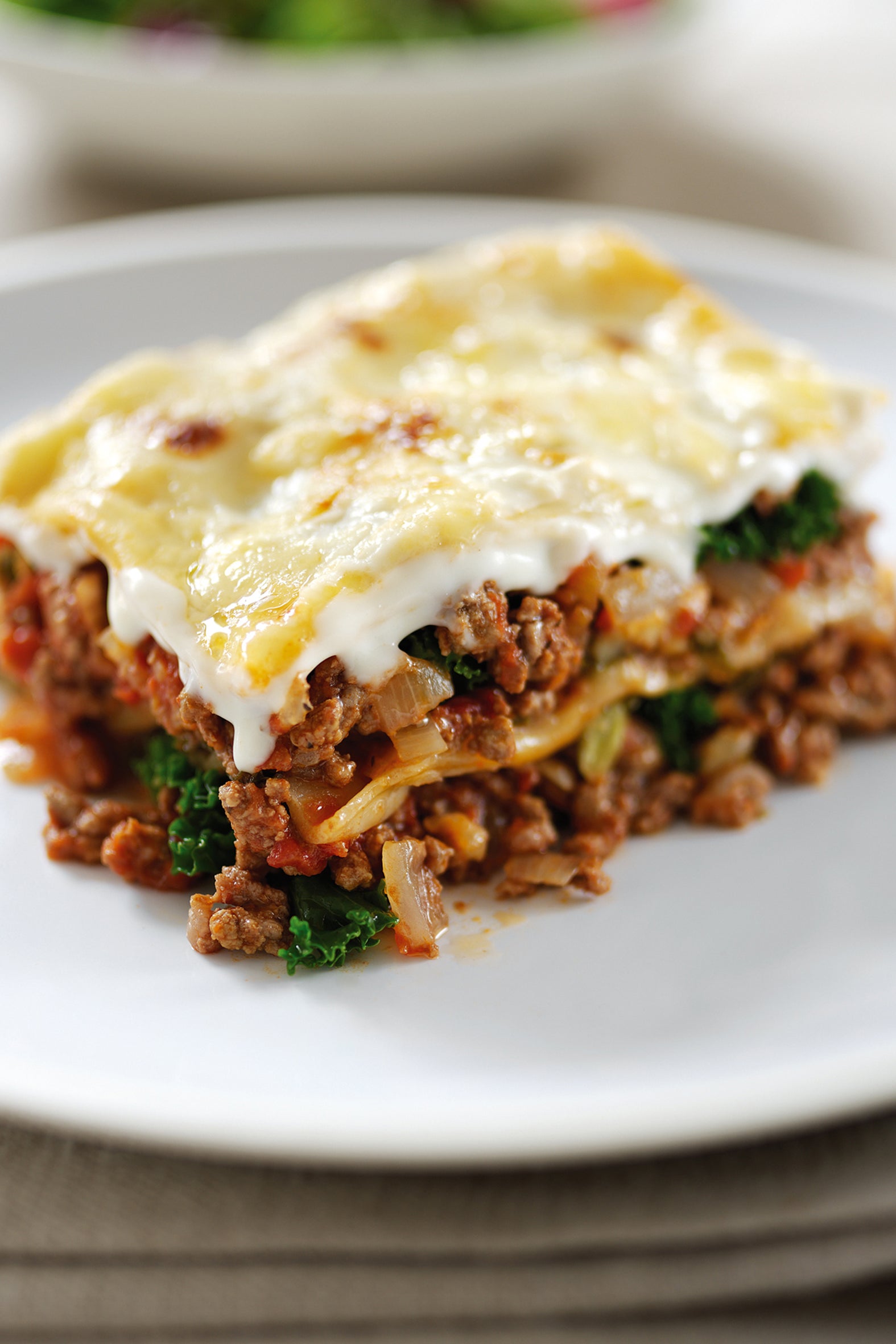Kale slips neatly into the rich beef and tomato layers of this simple family lasagne (Discover Great Veg)