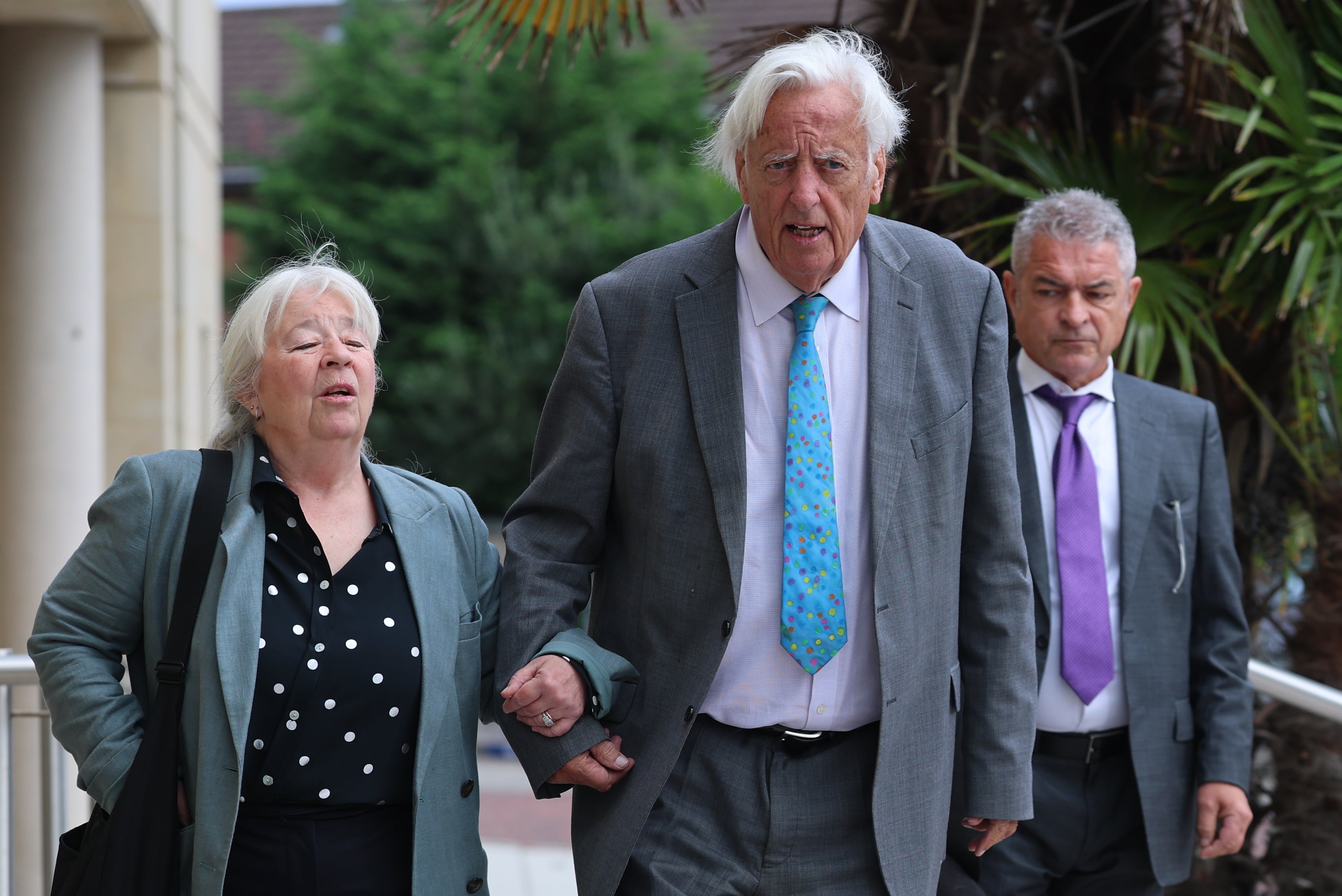 Siobhan Rose, nee Rush, (left) daughter of Elizabeth ‘Libbi’ Rush, Michael Mansfield KC (centre) and Andrew Rush, son of Elizabeth ‘Libbi’ Rush arriving at the inquiry (Liam McBurney/PA) (PA Wire)