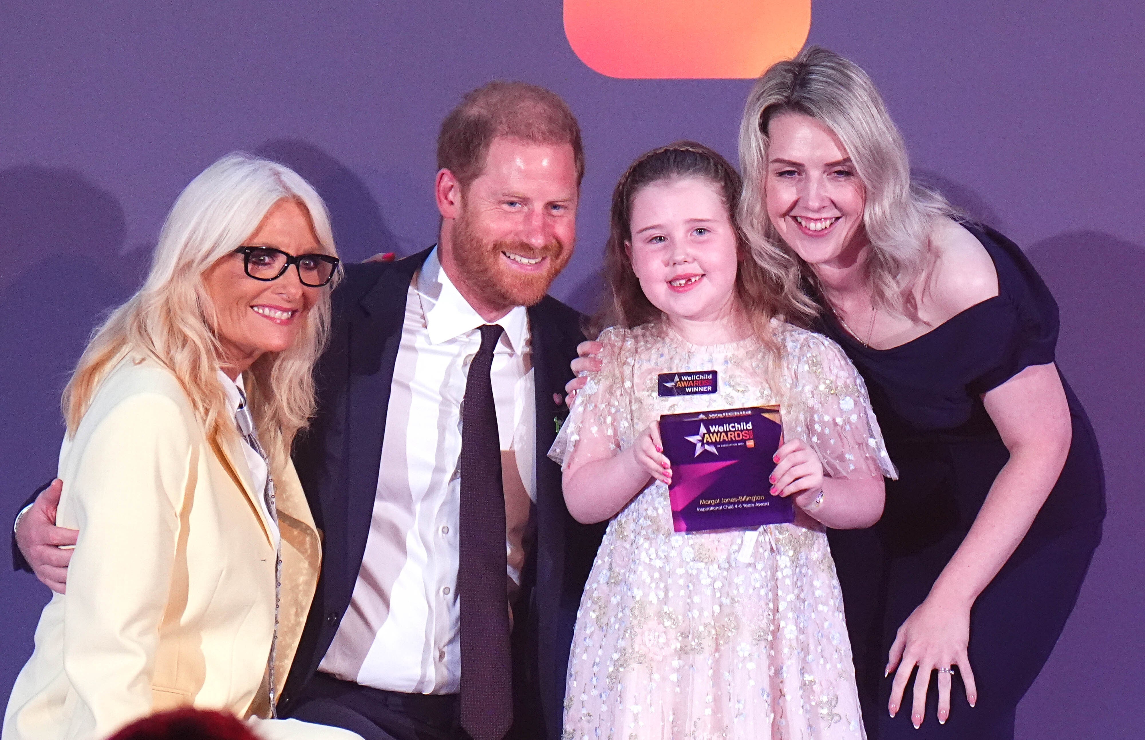 Prince Harry fights back tears as he praises parents caring for seriously ill children | The Independent