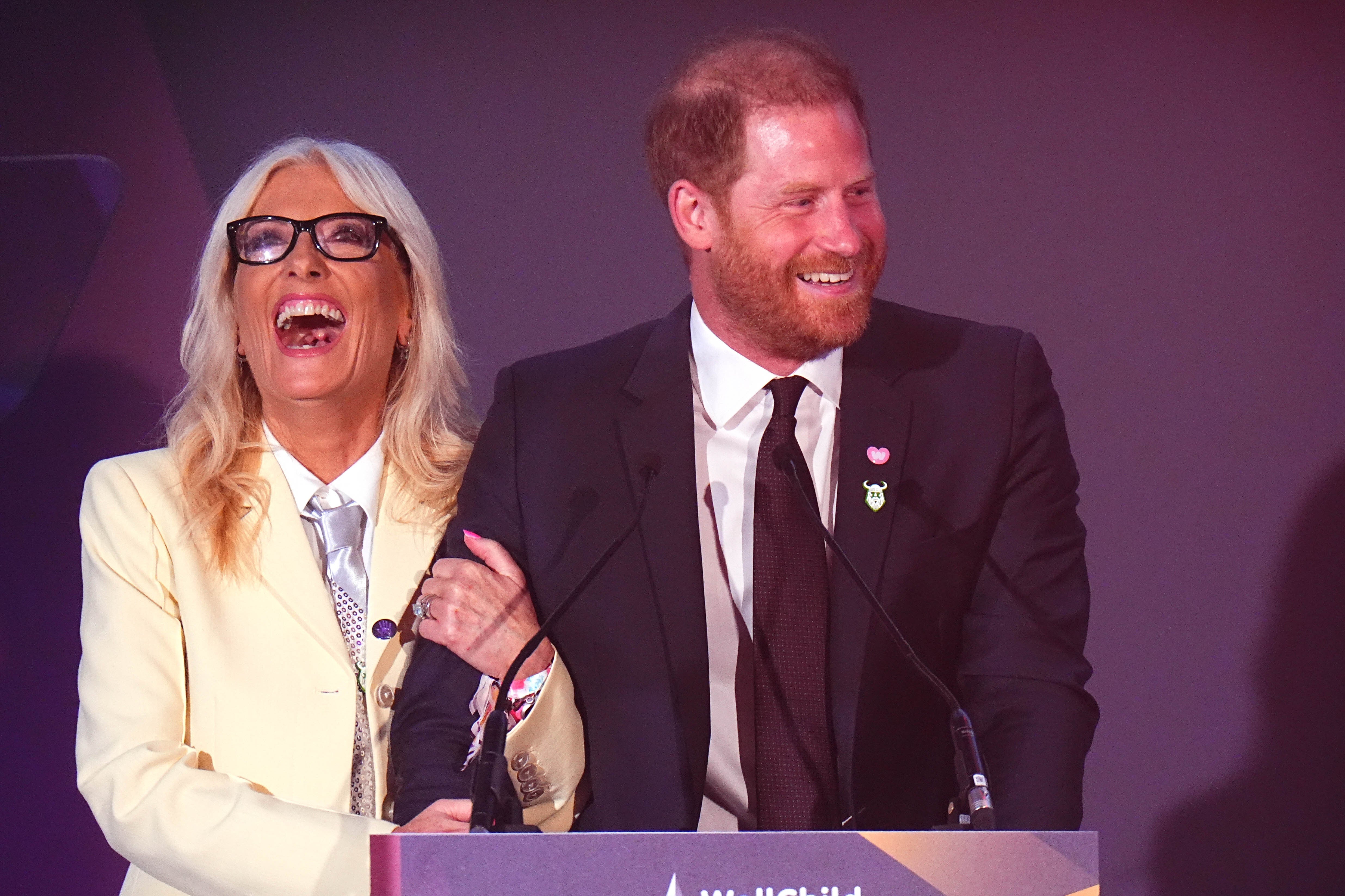 William is comforted by Gaby Roslin as he comes close to tears during the WellChild awards (Aaron Chown/PA)