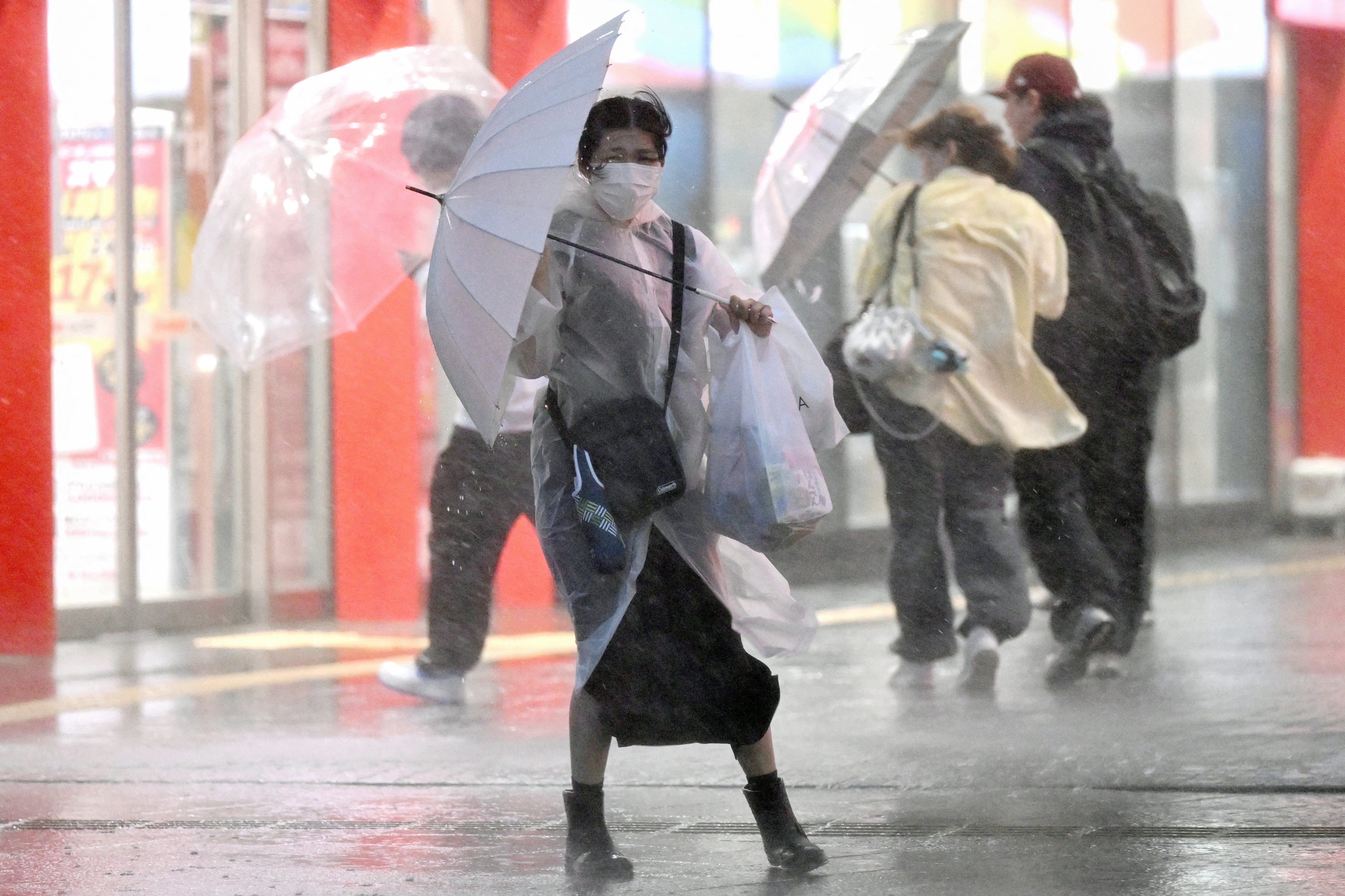 Four dead as Typhoon Dujuan leads to torrential rain and 1.5 million evacuations in Japan