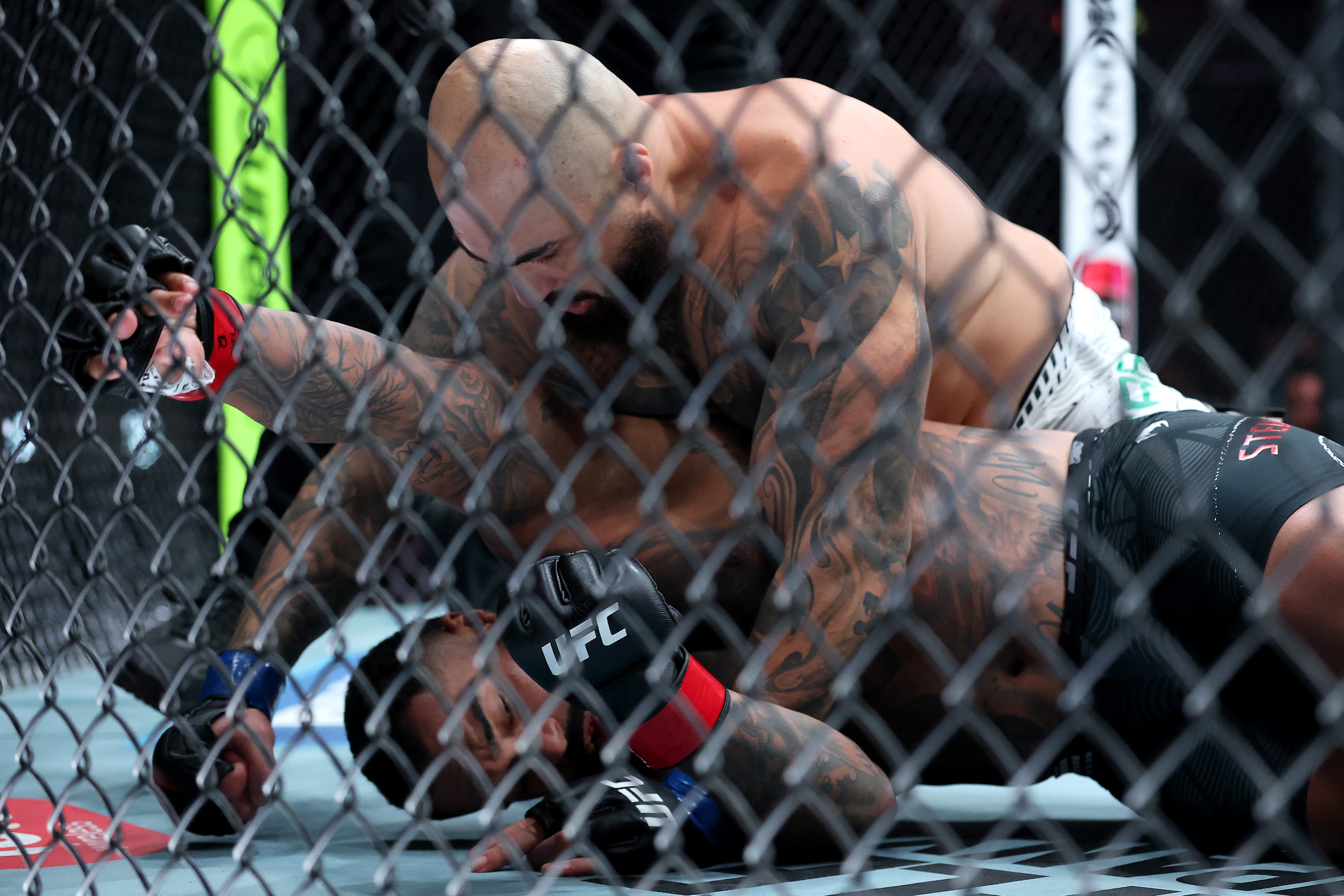 Sean Sharaf (top) was a seismic underdog against Gable Steveson