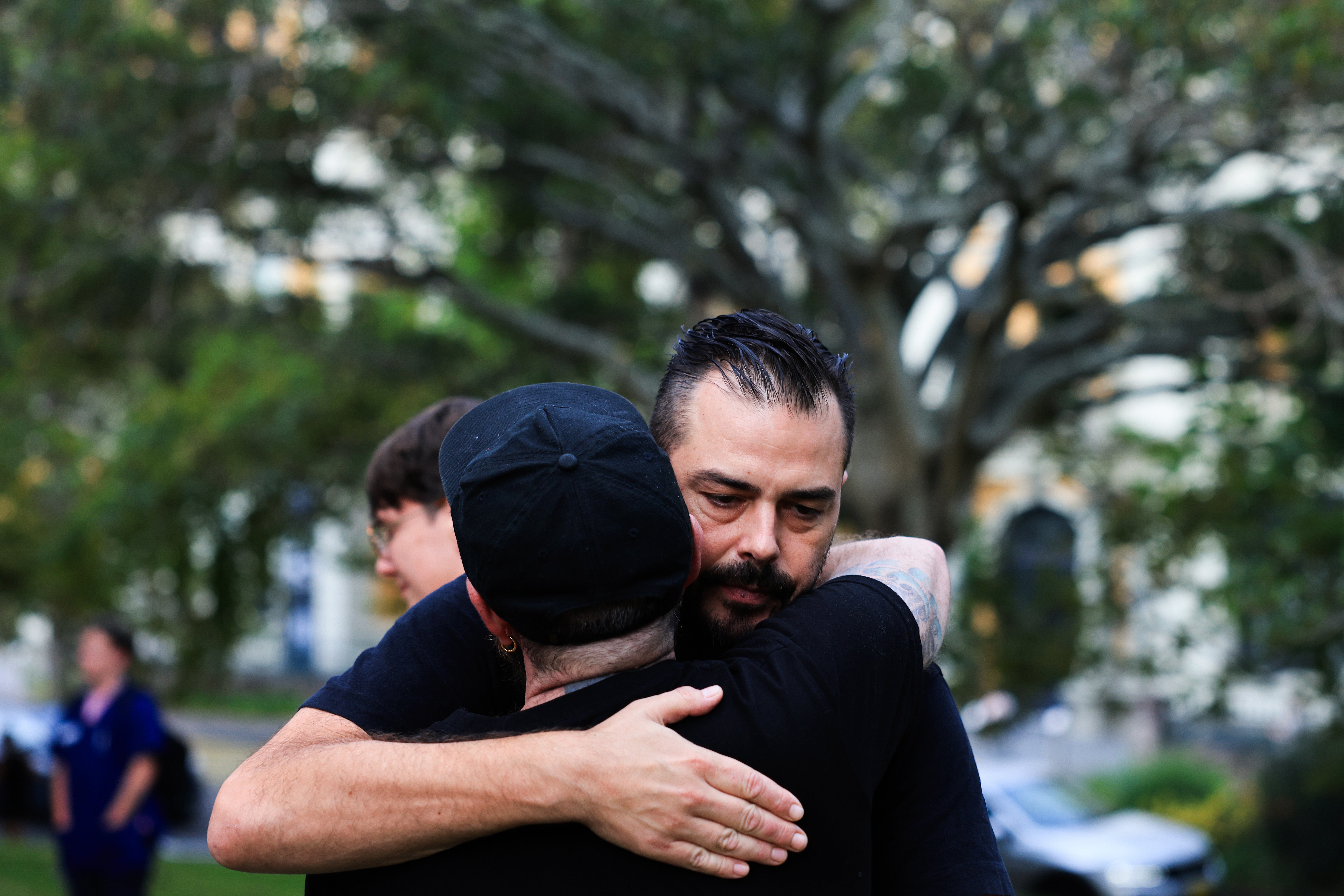 People gather to remember Jesse Baird and Luke Davies during a public vigil at Green Park on 1 March 2024 (Getty)