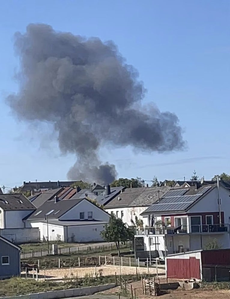 Smoke rising from the reported scene of the crash