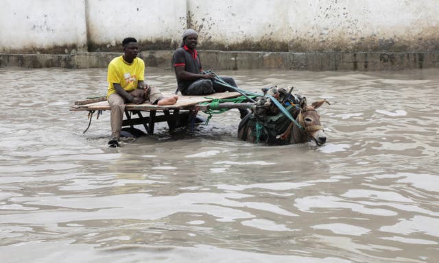 A donkey cart wades through flood waters following a heavy rainfall in Mogadishu, Somalia, earlier this month