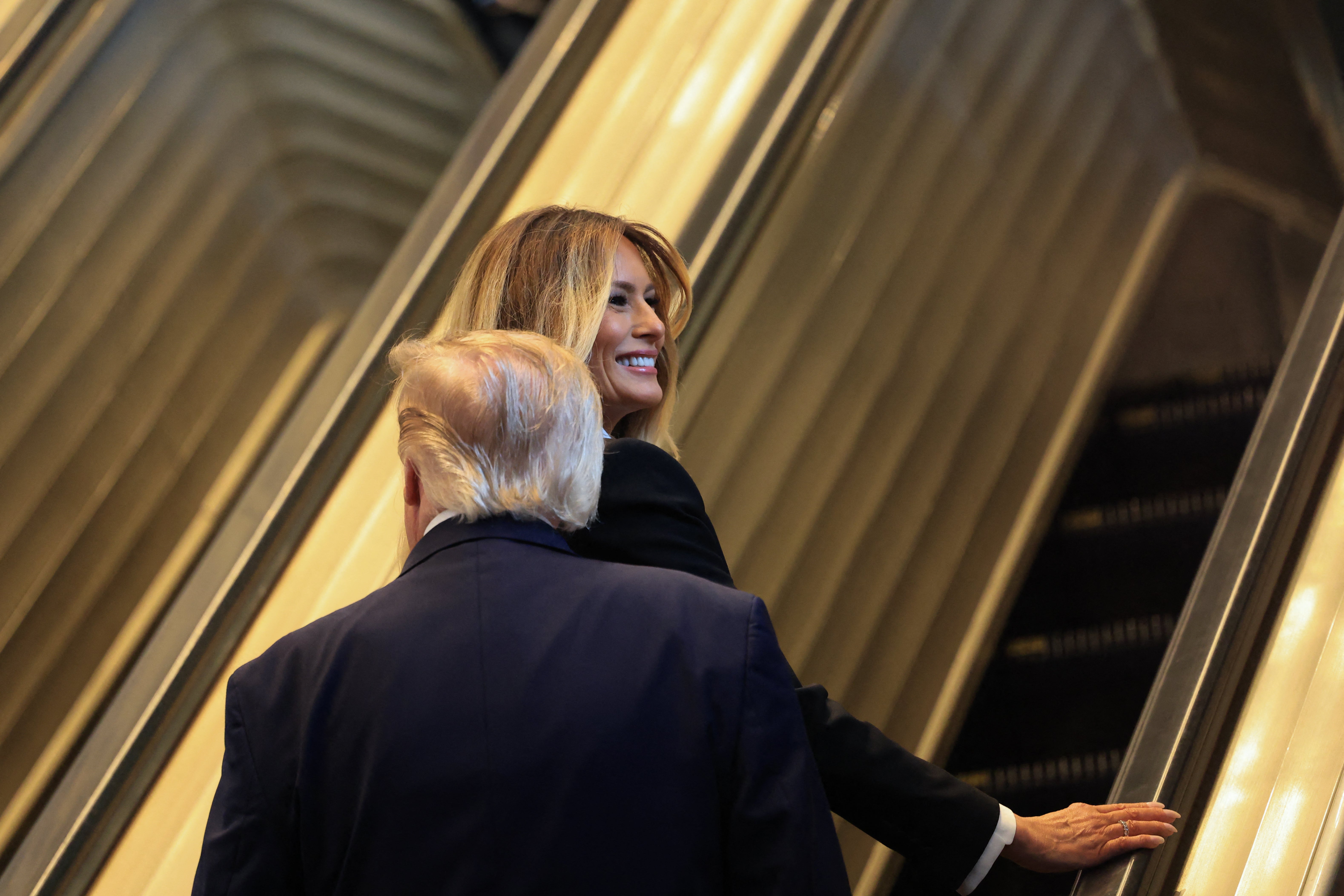 Trump concluded his brief remarks to reporters by claiming that the US was making ‘a lot of progress’ with the war in Iran, before walking to the escalator with first lady Melania Trump