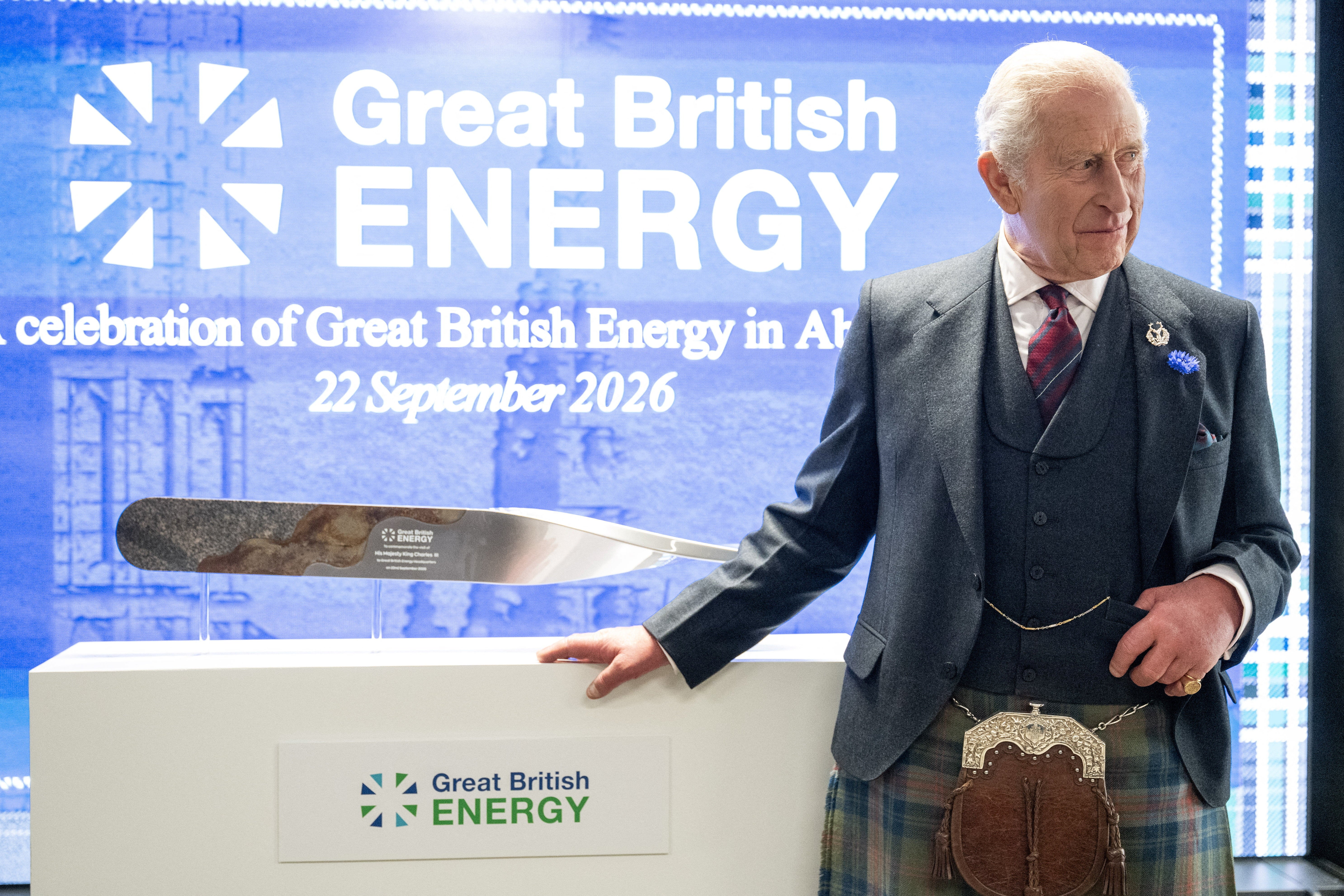 King Charles stands next to a plaque after unveiling it during a visit to the new Great British Energy headquarters in Aberdeen (Reuters)