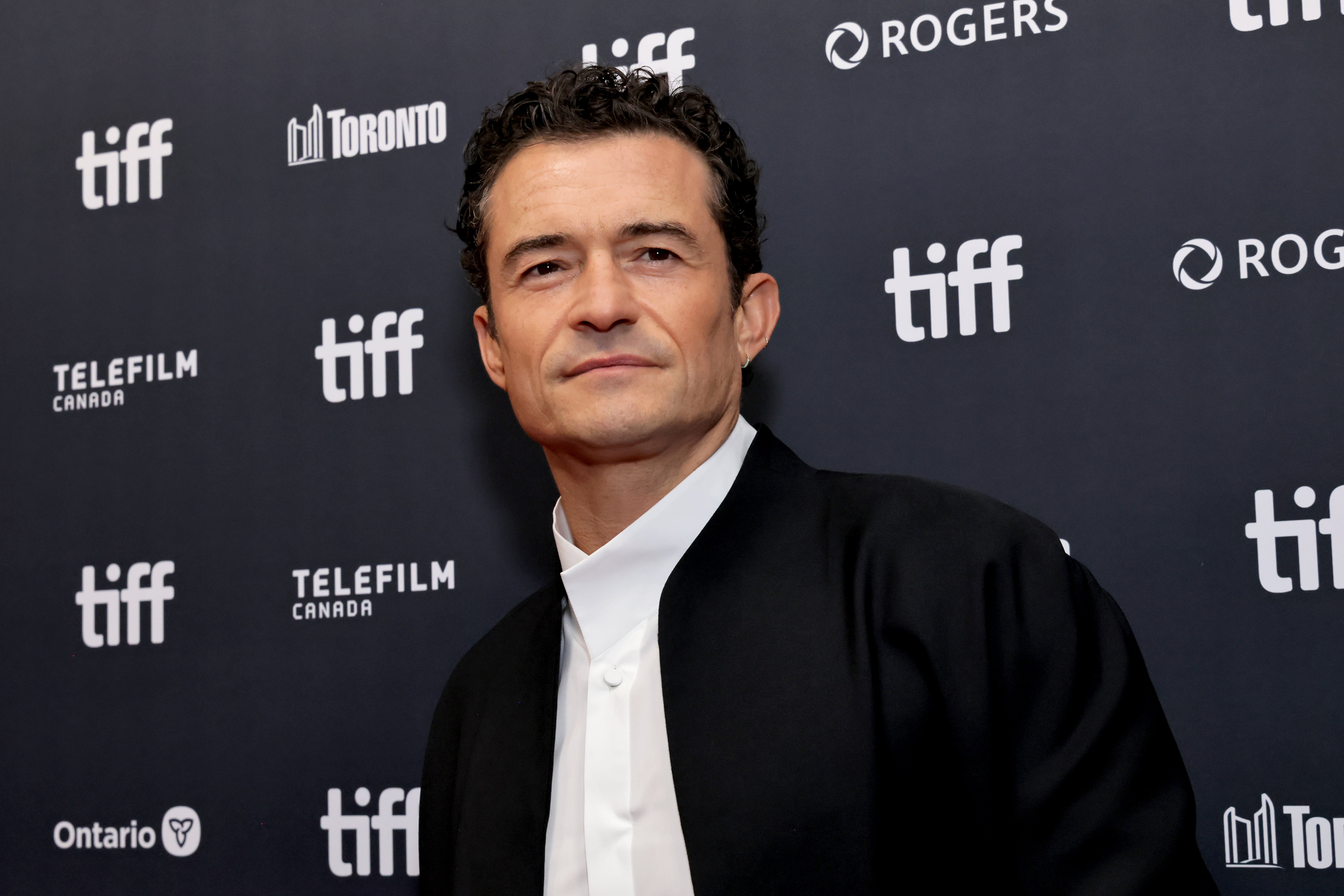 Orlando Bloom has said the ménage à trois in ‘Bucking Fastard’ reflects the character’s carnal desires