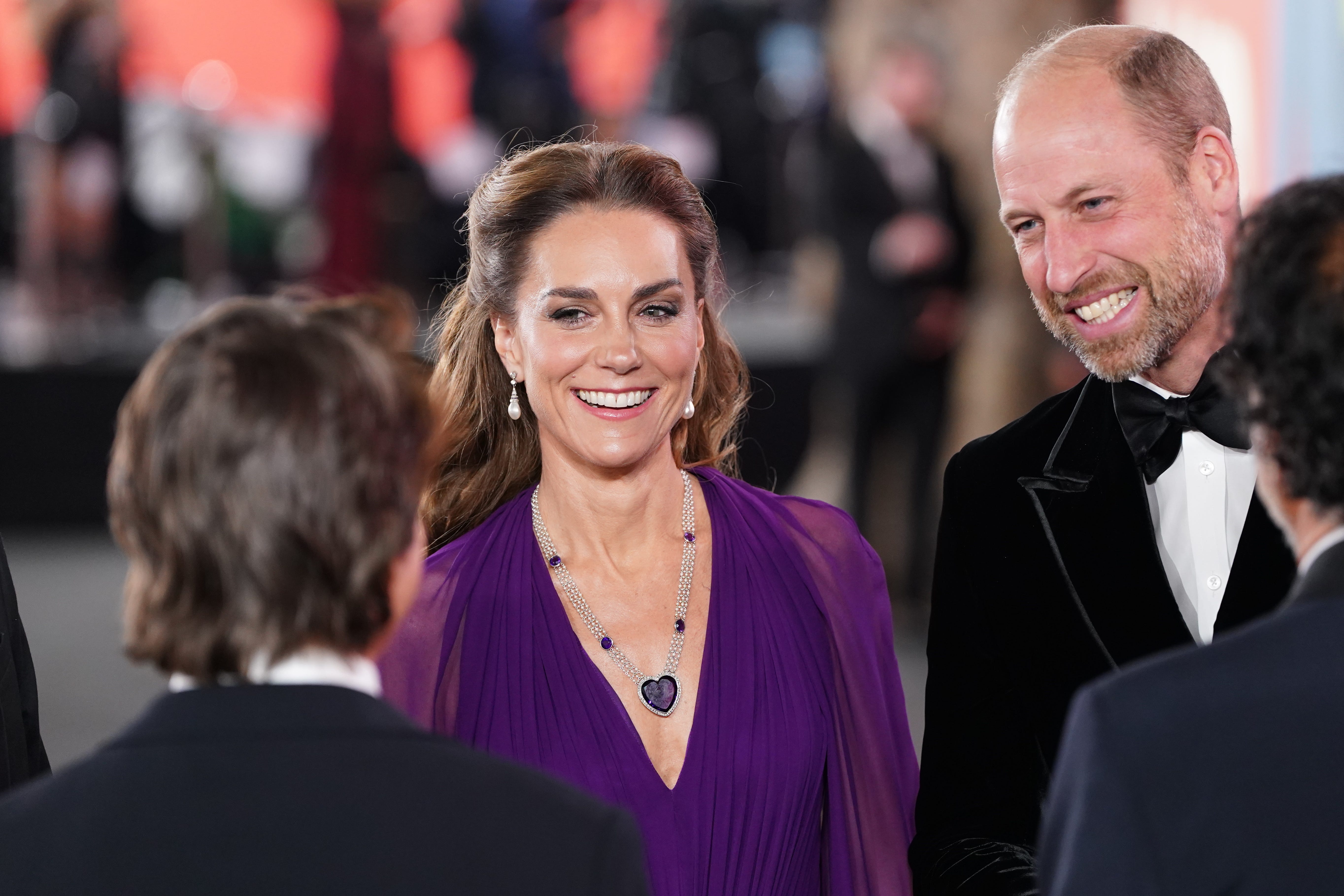 The Prince and Princess of Wales greet Tom Cruise at the Royal Film Performance of Digger, at the Odeon Luxe in Leicester Square, central London (Ian West/PA)