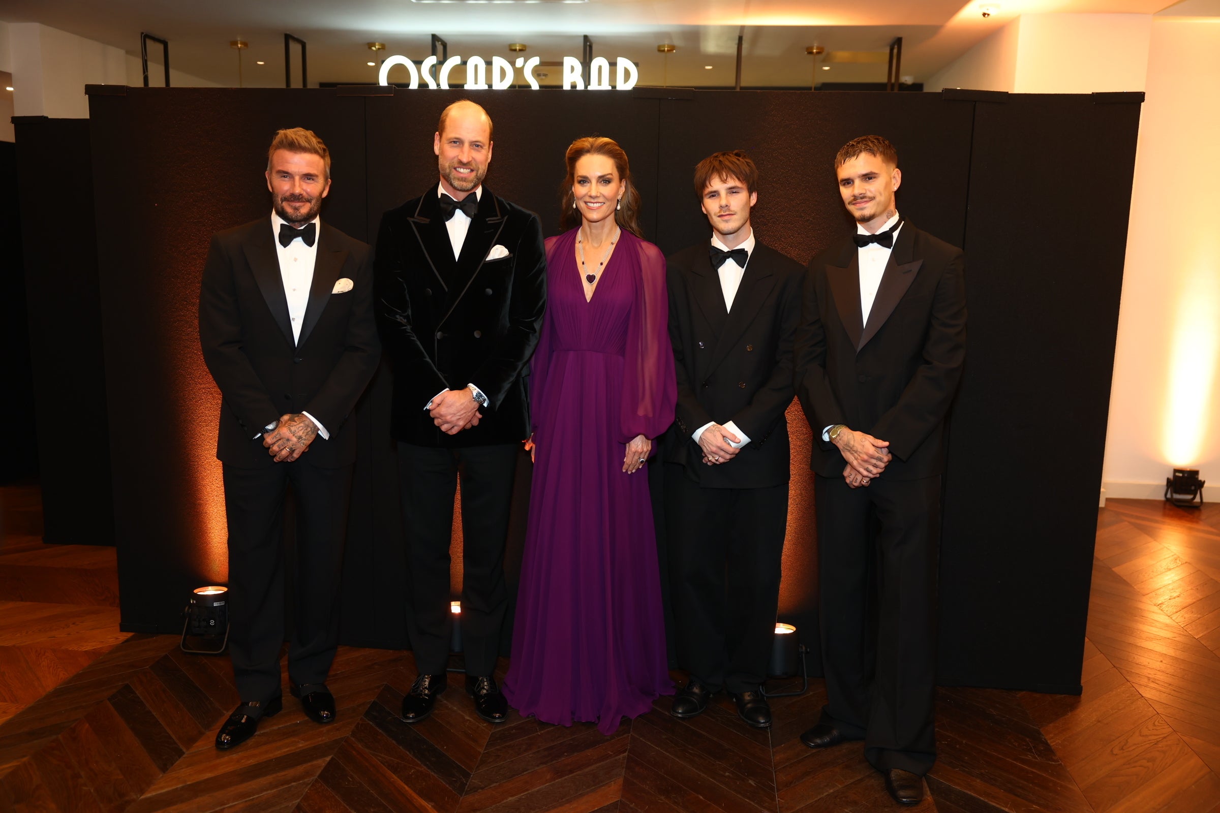 The Prince and Princess of Wales with David Beckham and his songs Cruz, second right, and Romeo, right