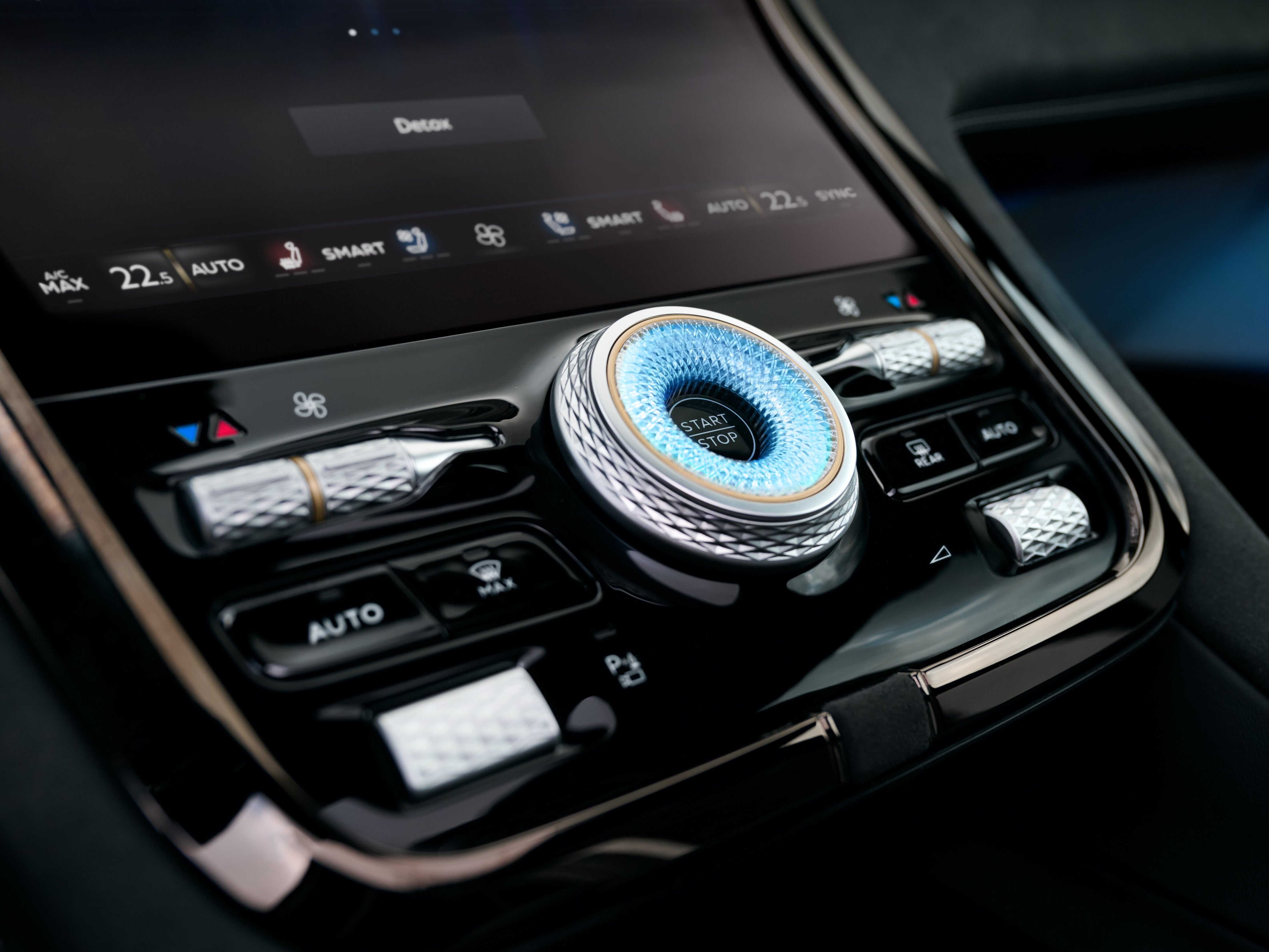 Traditional analogue controls sit alongside advanced features like the curved touchscreen (Bentley)