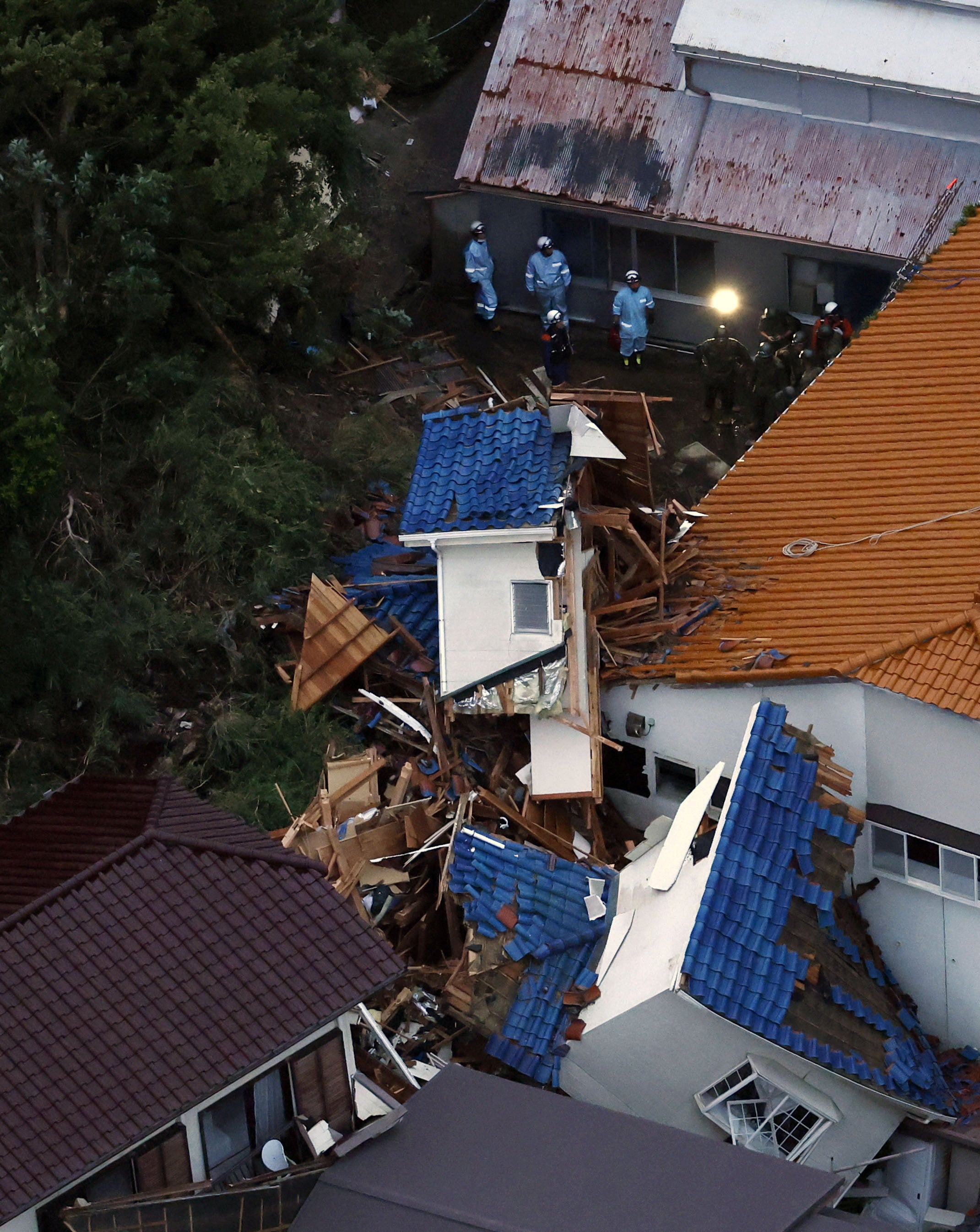 The site of a mudslide in Kamogawa in Chiba Prefecture, eastern Japan, following heavy rain caused by Typhoon Dujuan, September 22, 2026 in this photo taken by Kyodo (Reuters)