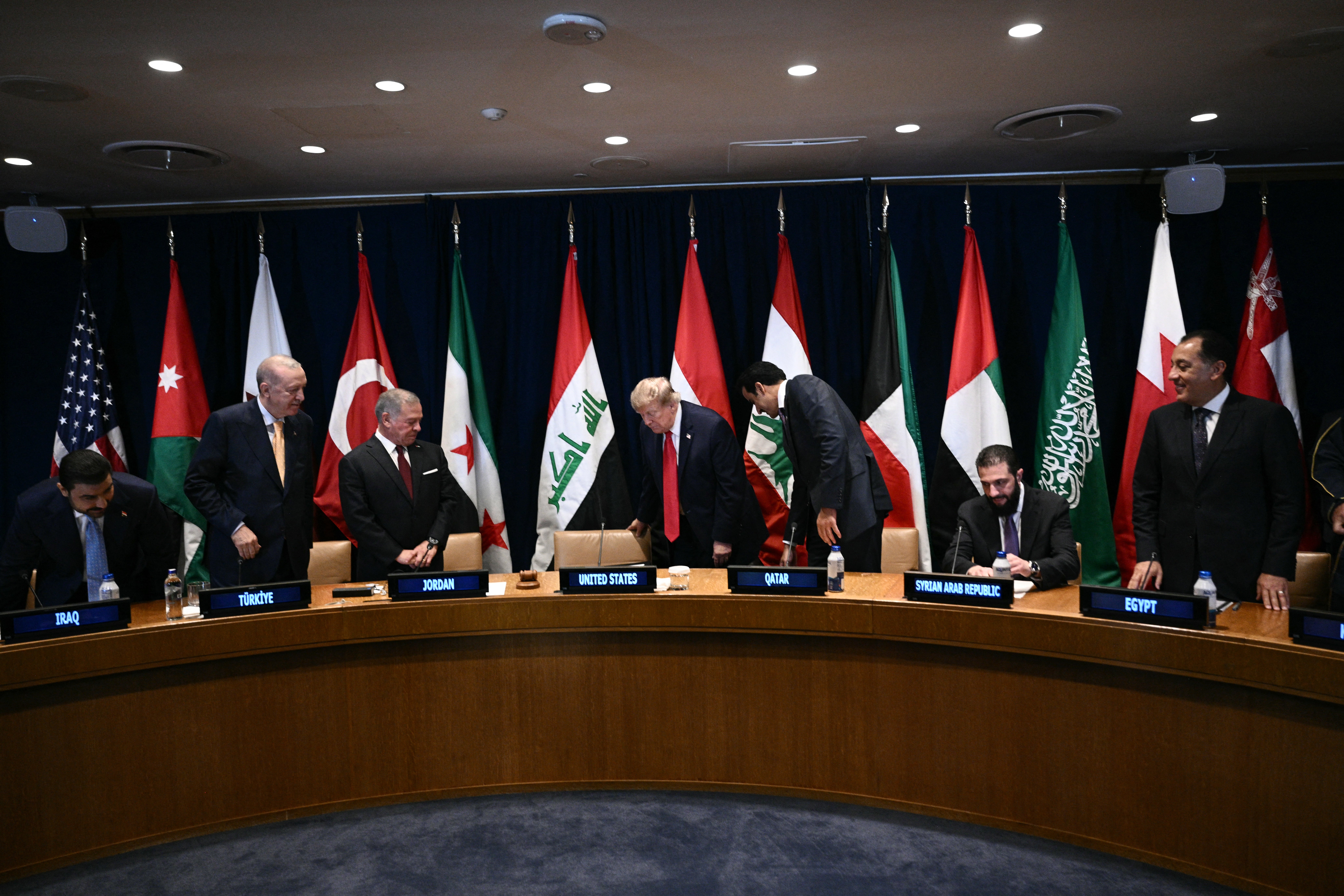 US President Donald Trump (C) attends a Gulf Cooperation Council (GCC) multilateral meeting alongside (L/R) Iraqi Prime Minister Ali al-Zaidi, Turkey's President Recep Tayyip Erdogan, King Abdullah II of Jordan, Qatar's Emir Sheikh Tamim bin Hamad al-Thani and Syrian President Ahmed al-Sharaa on the sidelines of the 81st United Nations General Assembly in New York (AFP/Getty)