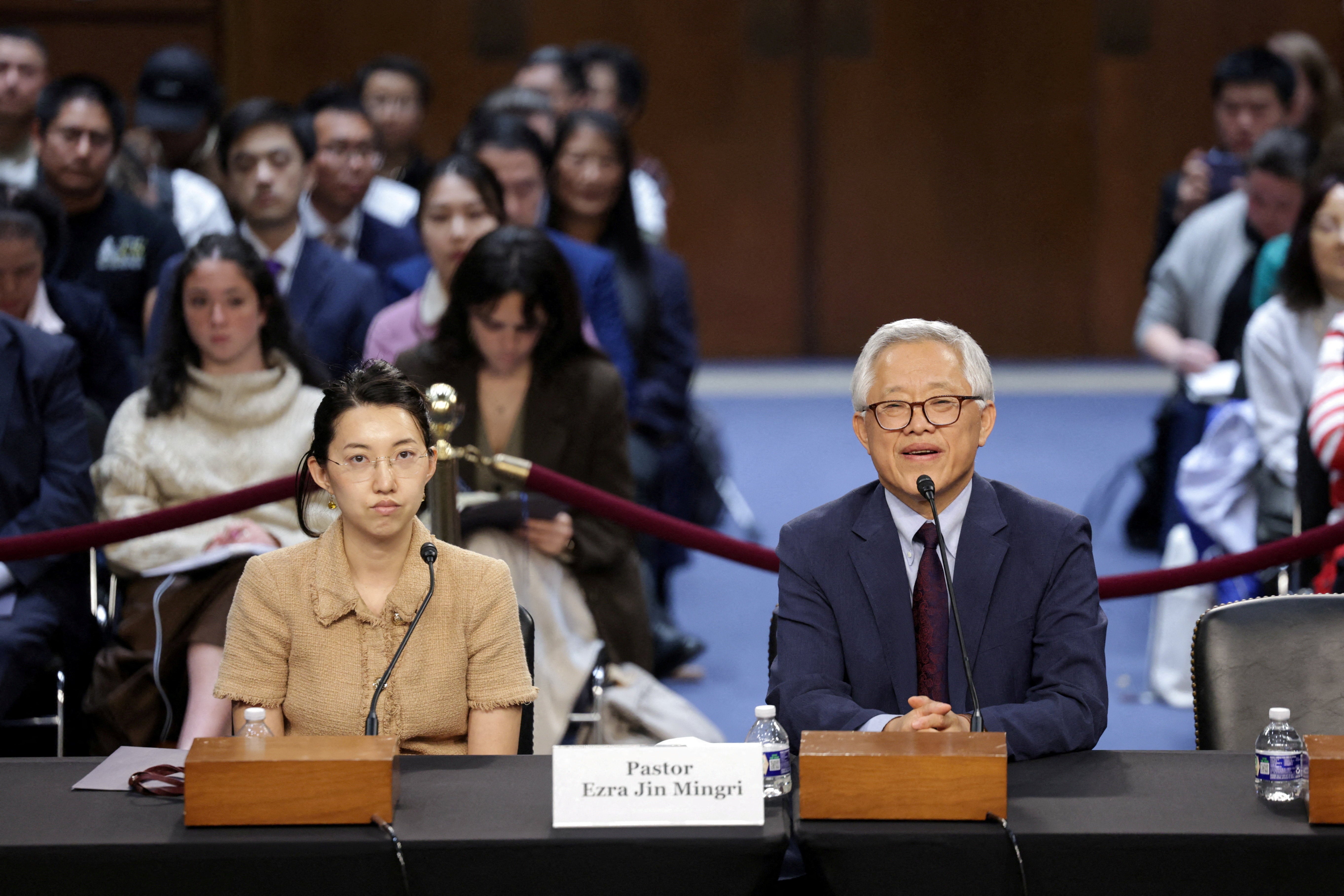 Pastor Ezra Jin Mingri with his daughter Grace