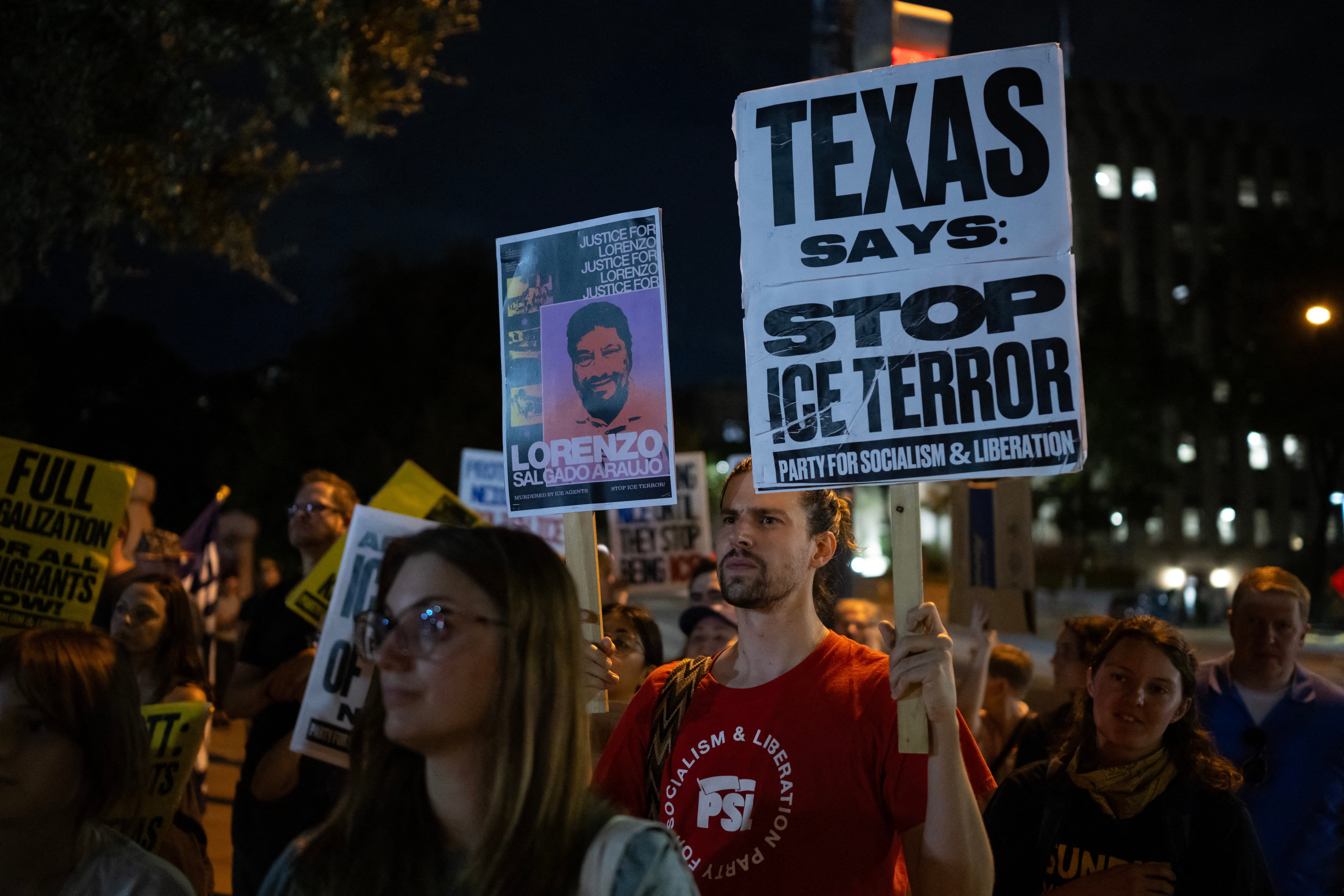 People protest outside the Texas State Capitol in Austin, Texas, on September 21, 2026, a day after a Venezuelan national was shot and wounded during a US Immigration and Customs Enforcement (ICE) operation