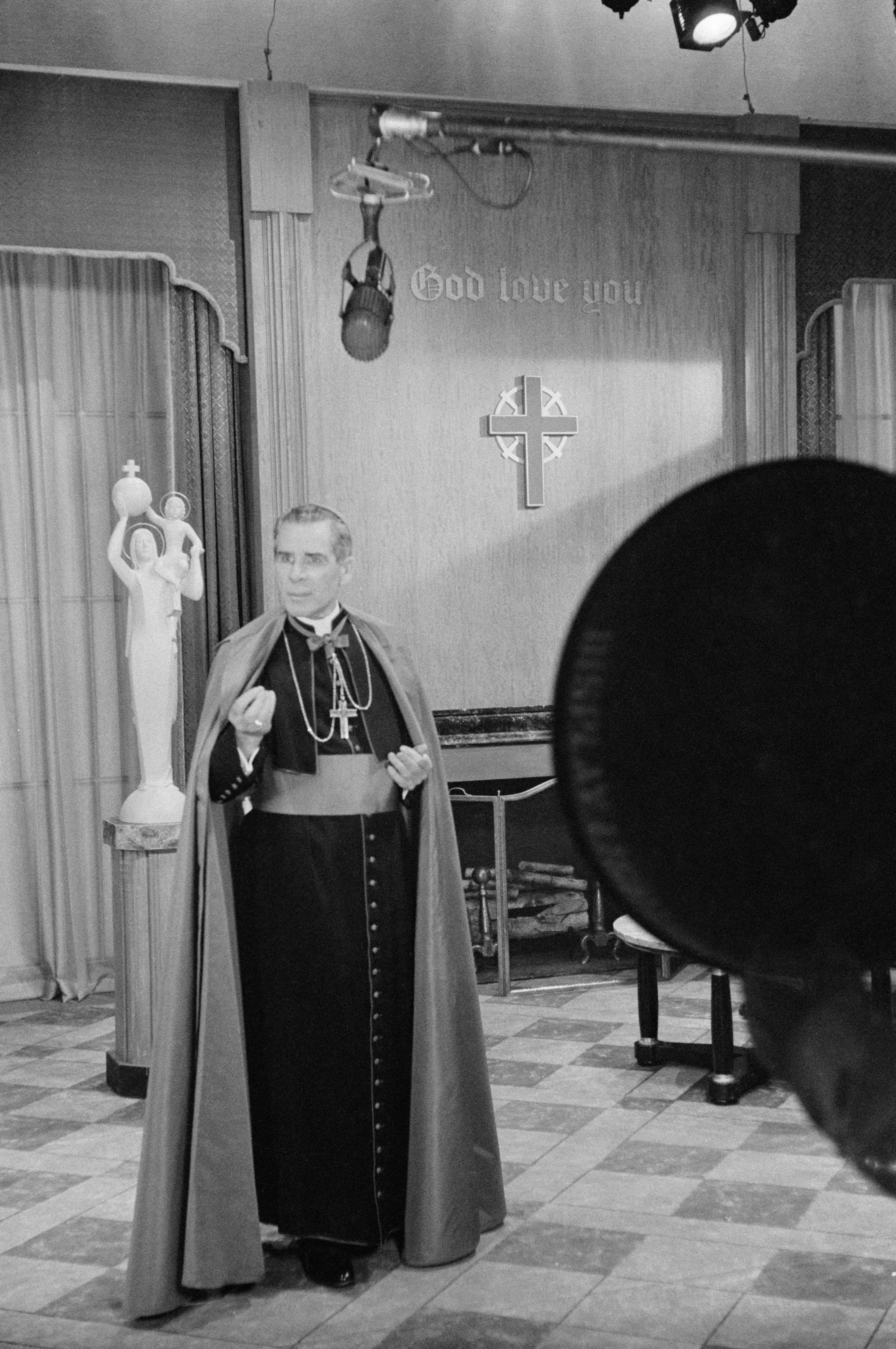 Fulton J. Sheen on the set of the television series 'Life is Worth Living' in New York City, circa 1955