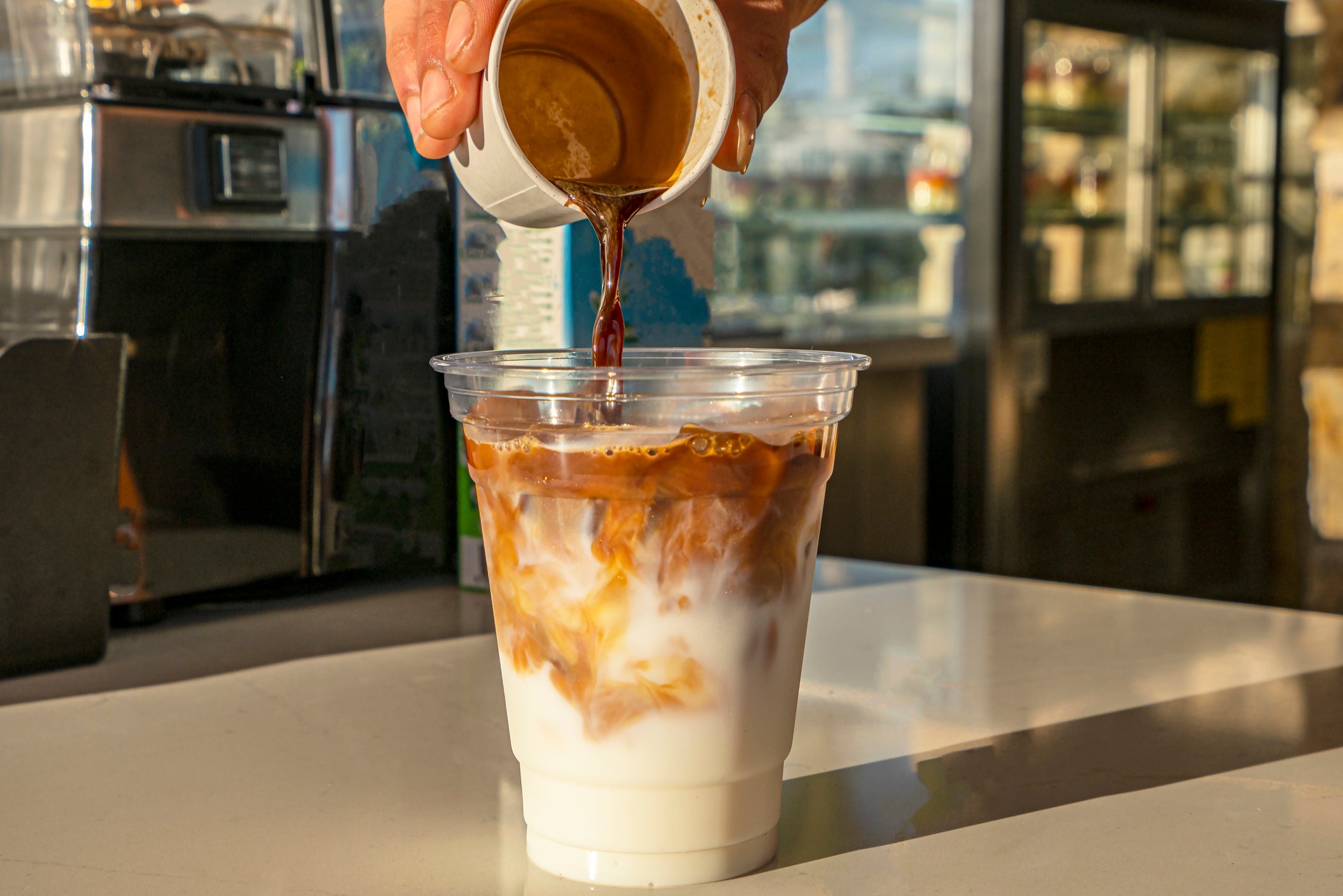 Some young people argue that coffee is no different from drinking water to stay hydrated (Getty)