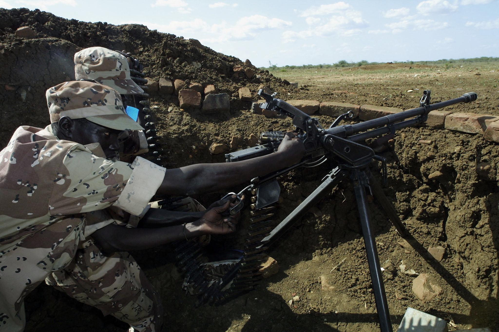 David Greenhalgh and Christos Farmakis helped broker deals to supply thousands of assault rifles to war-torn nations such as South Sudan.