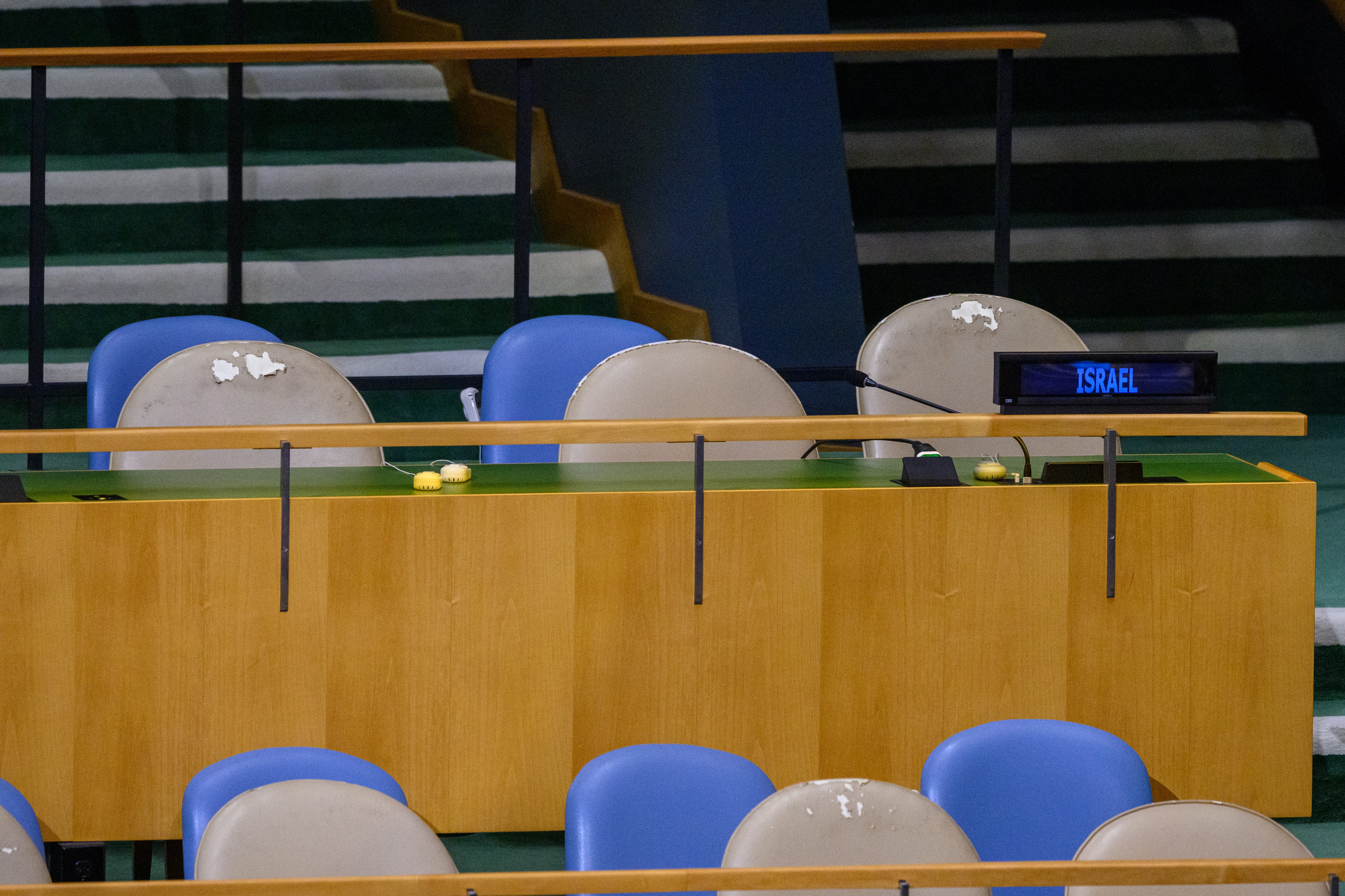 Seats for the Israel delegation remain empty during the speech by Iran’s President Pezeshkian