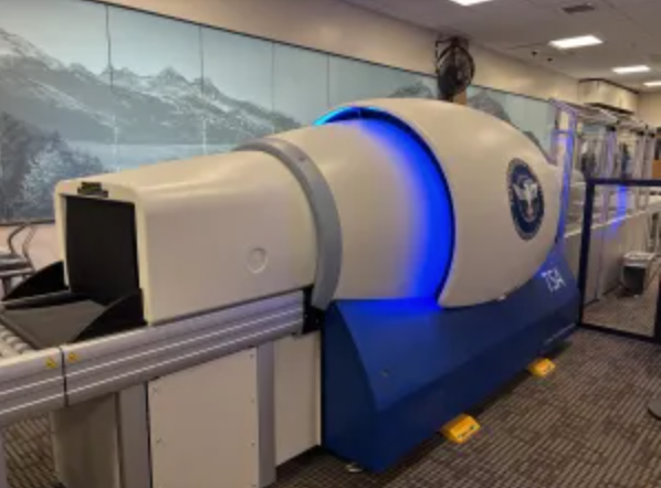 A new CT scanner at Juneau International Airport in Juneau, Alaska. The new CT scanners provide TSA agents with 3-D images of the contents of travelers' bags, but because the device has a smaller opening, larger carry-on bags may need checked if they cannot fit inside
