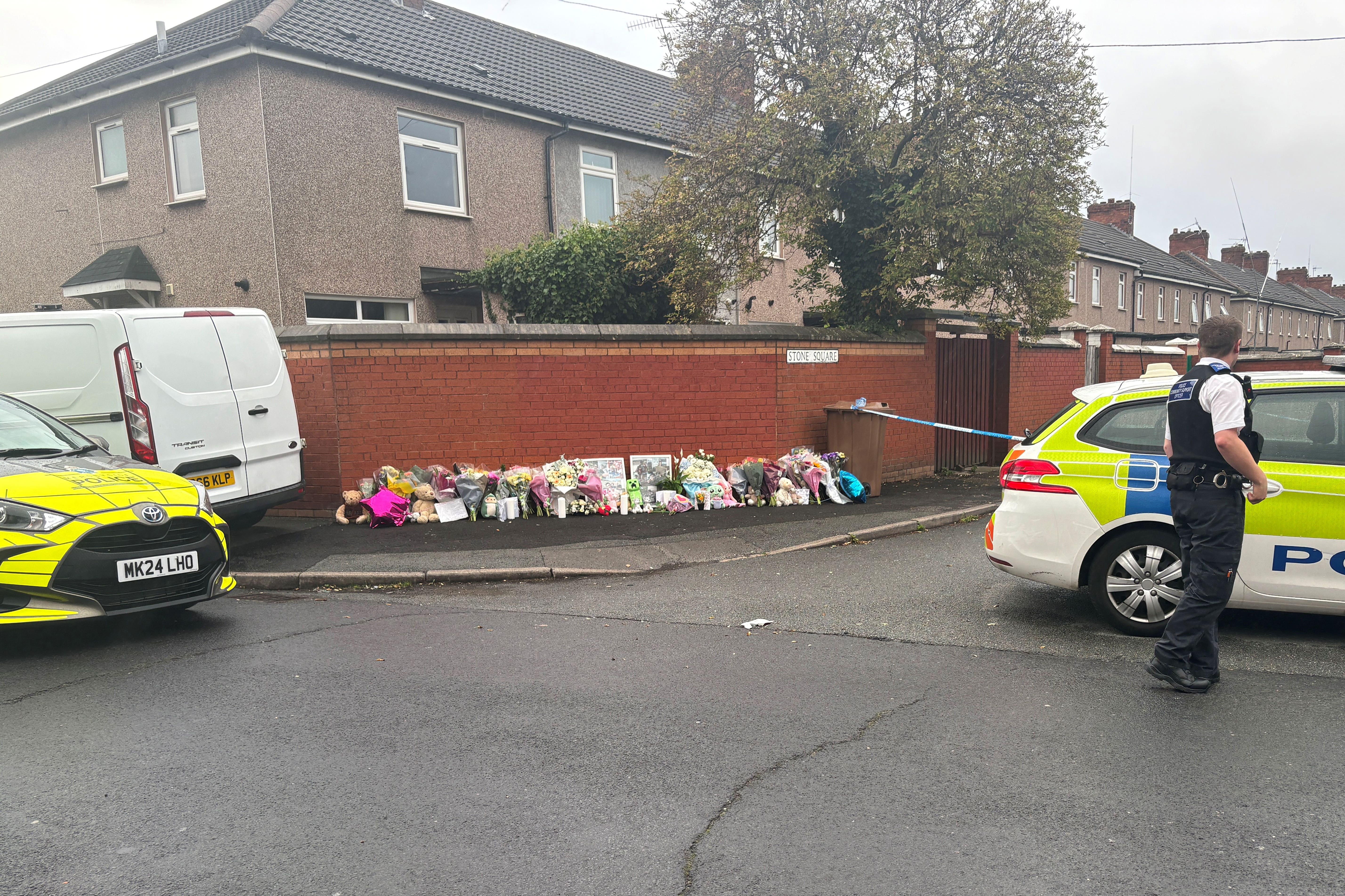 Floral tributes near to the scene in Stone Square in Bootle