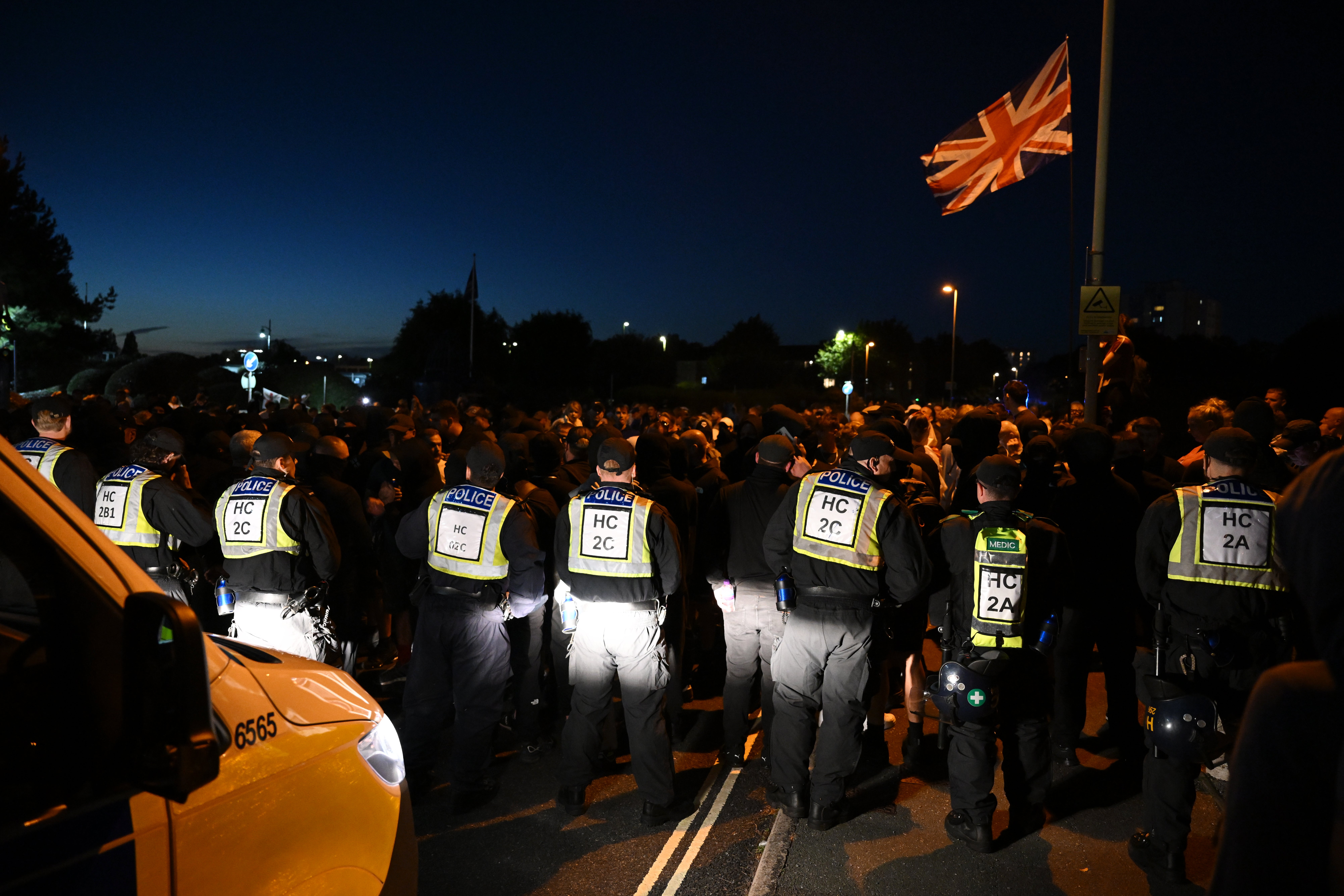 Three people charged with assaulting emergency workers during anti-migrant protest in Gosport