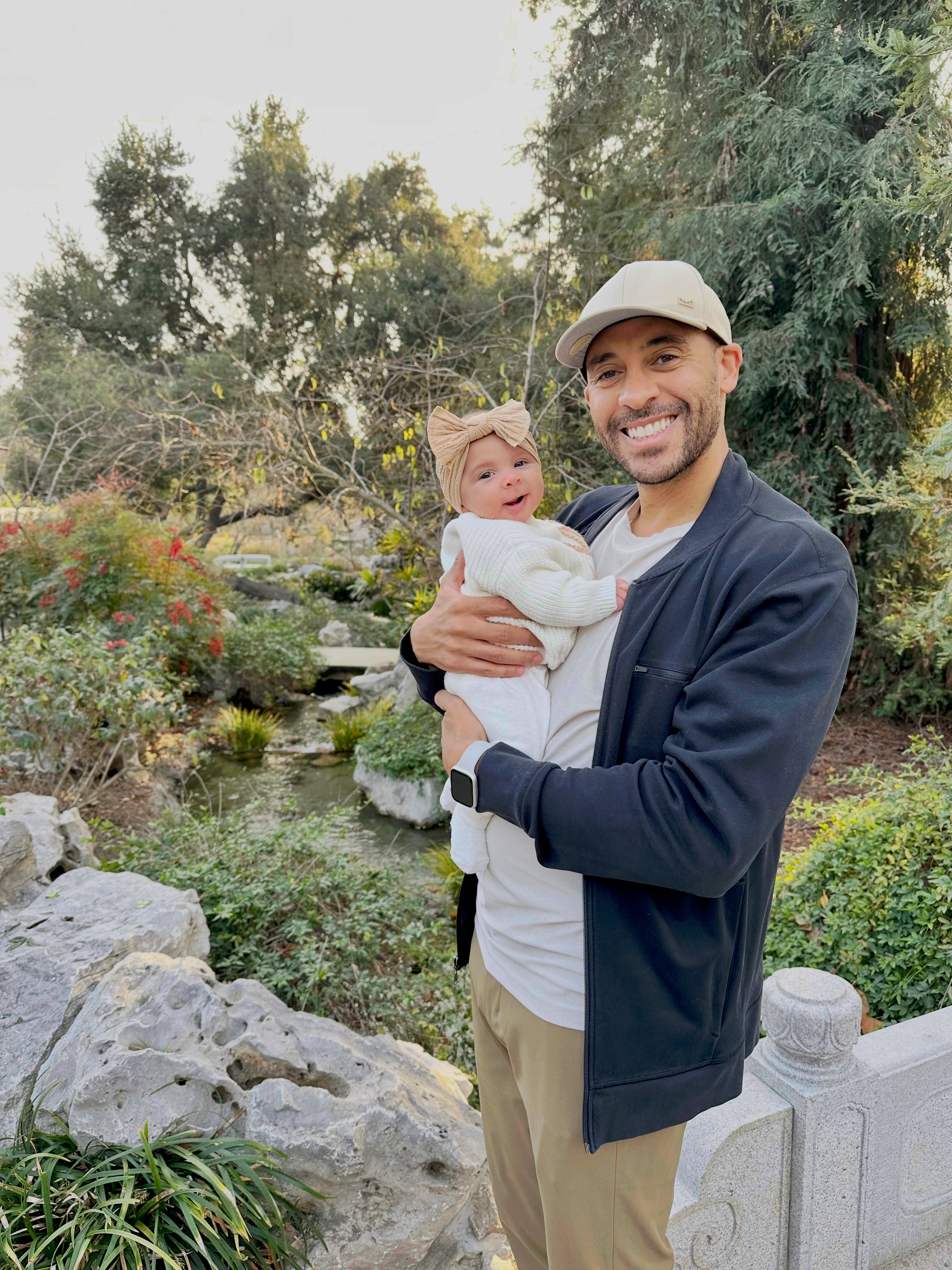 Former RAF pilot Chris Gordon with his daughter (handout/PA)