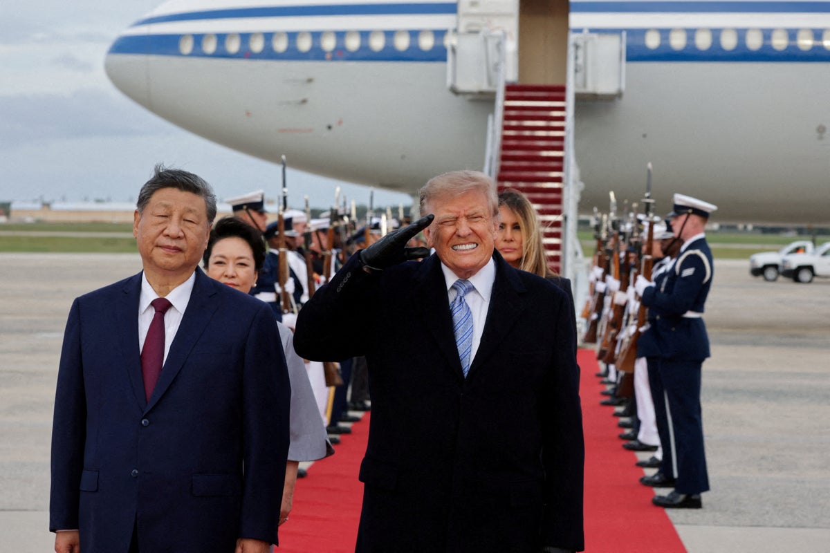 Trump flinched next to China’s Xi during a military flyover - and it became an instant meme