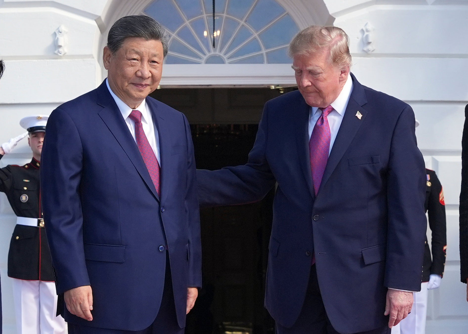 President Donald Trump, right, greets China's President Xi Jinping on the South Portico of the White House,