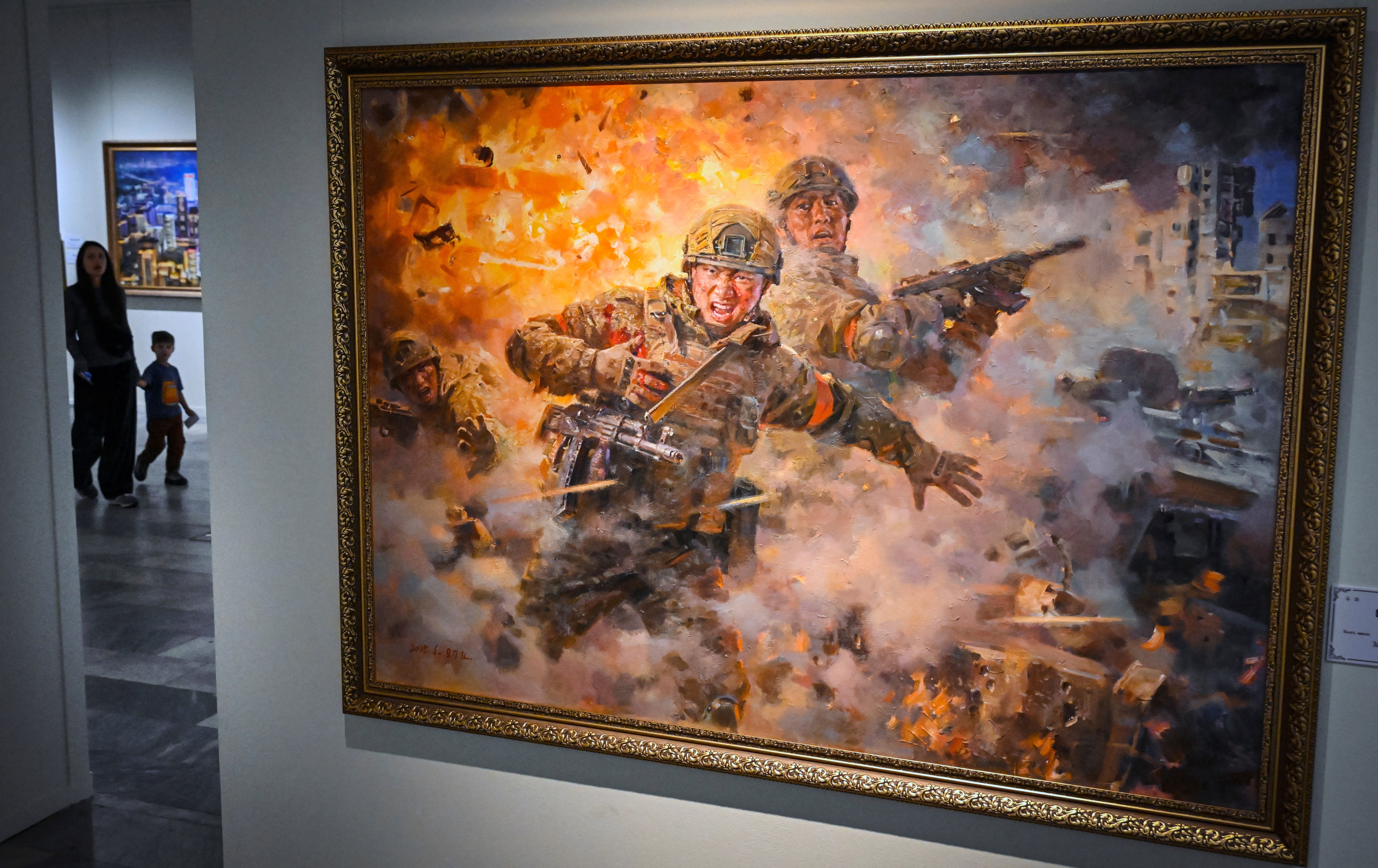 ‘For the Combat Comrade’ by Mueongjin Oh is displayed at a North Korean arts exhibition in Moscow (AFP/Getty)